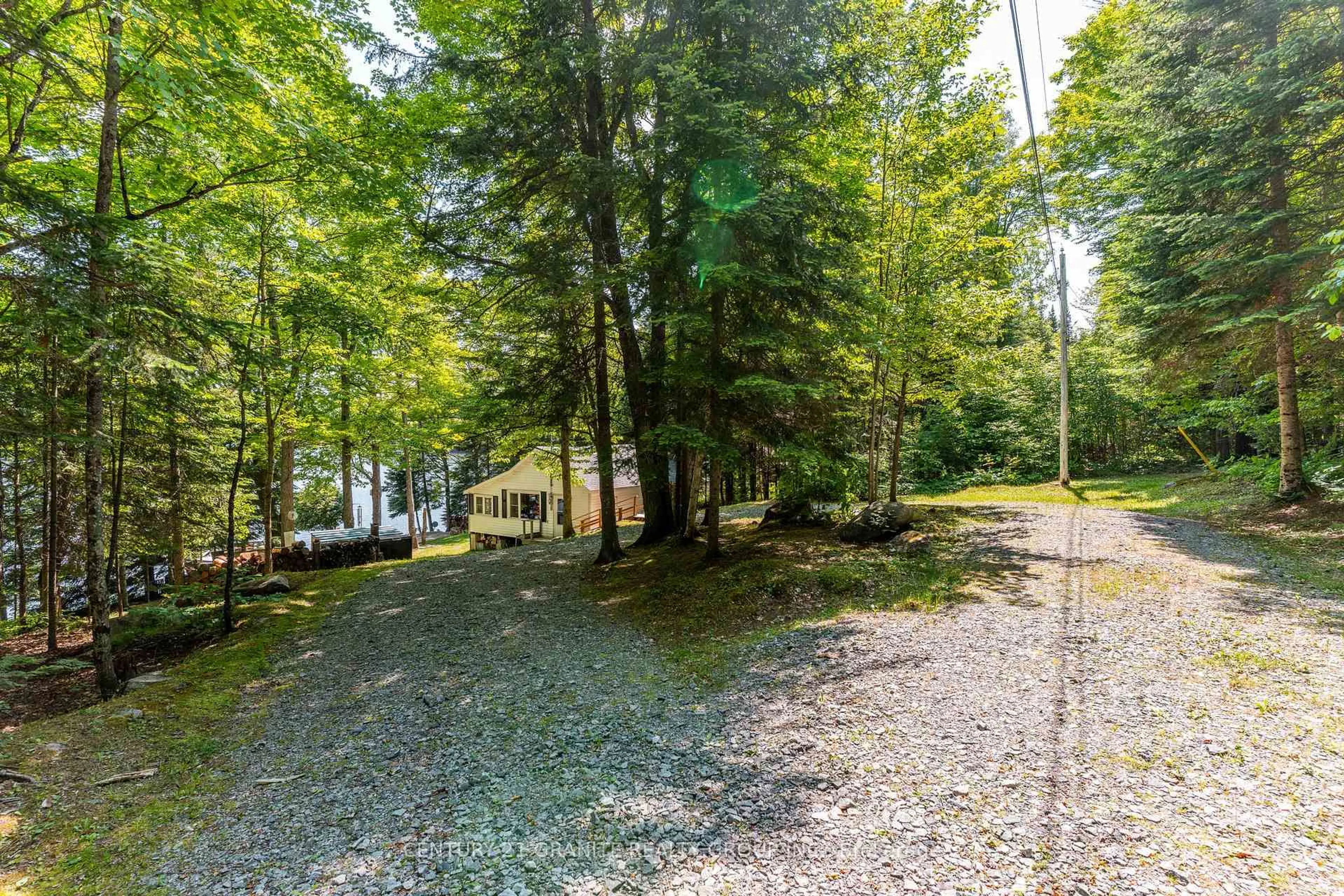A pic from outside/outdoor area/front of a property/back of a property/a pic from drone, water/lake/river/ocean view for 509 Dog Bay Rd, Maynooth Ontario K0L 2S0
