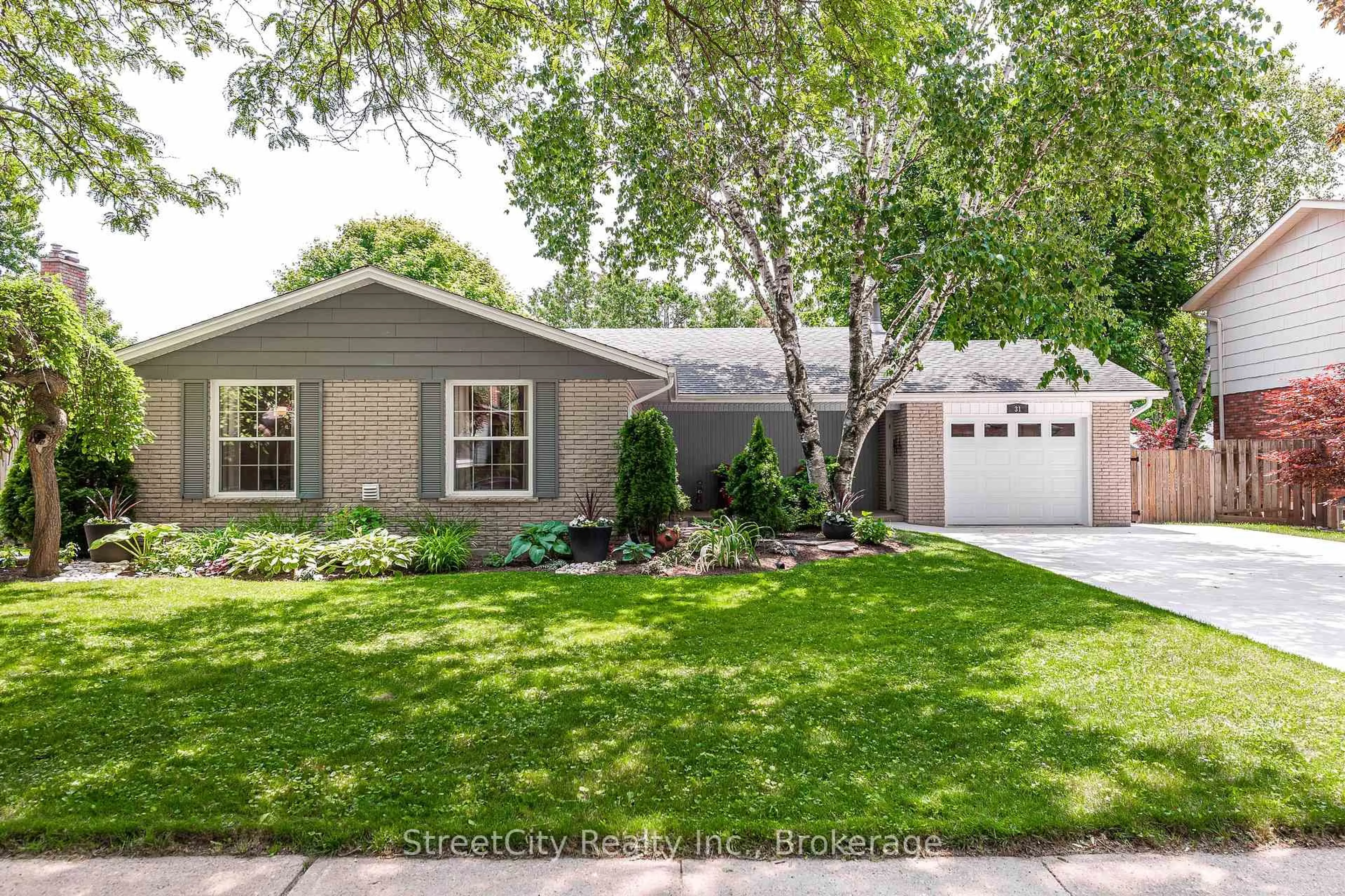 Home with vinyl exterior material, street for 31 Park Lane Dr, Stratford Ontario N5A 5C1