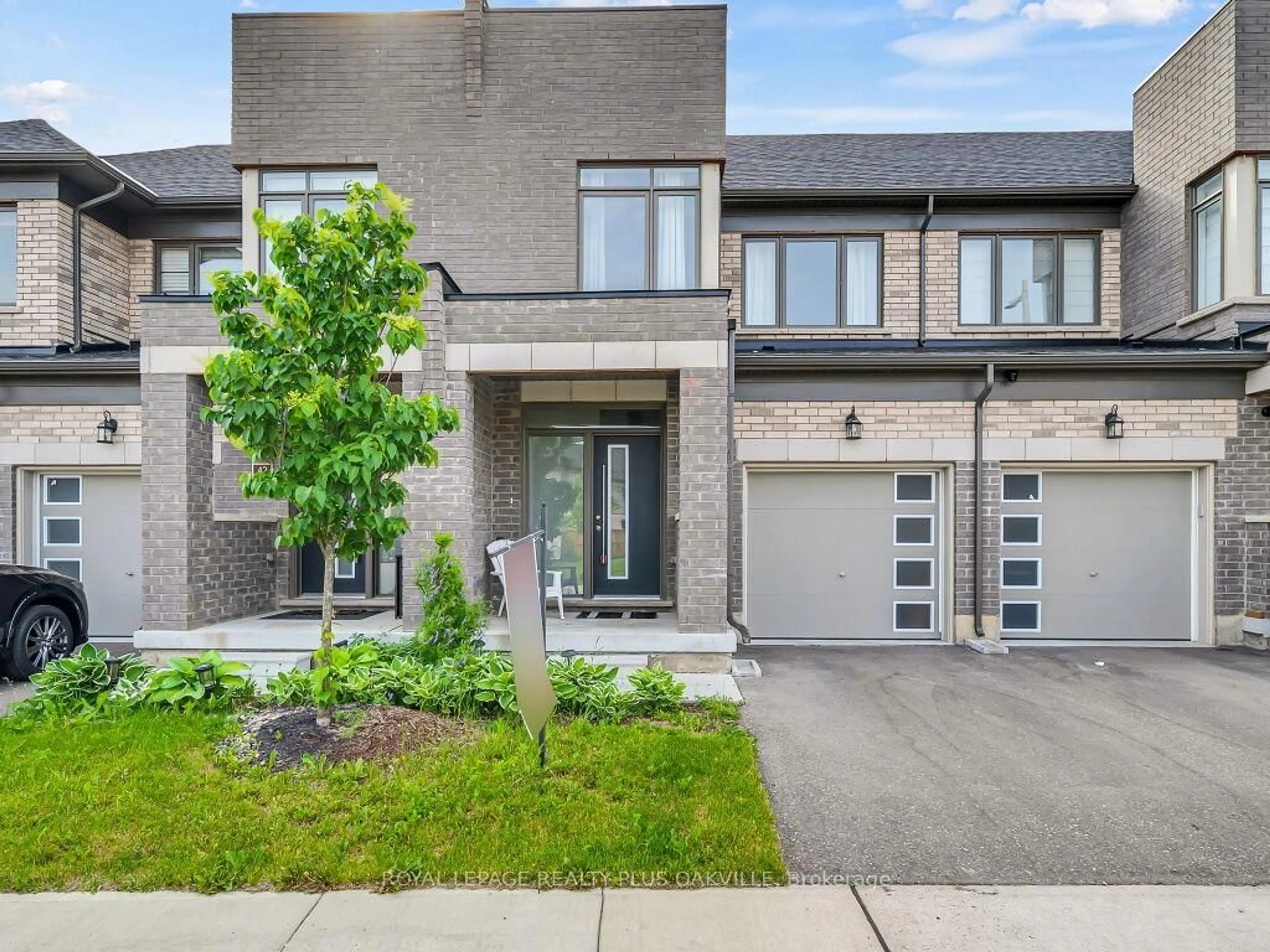 Home with brick exterior material, street for 166 Deerpath Dr #43, Guelph Ontario N1K 0E2