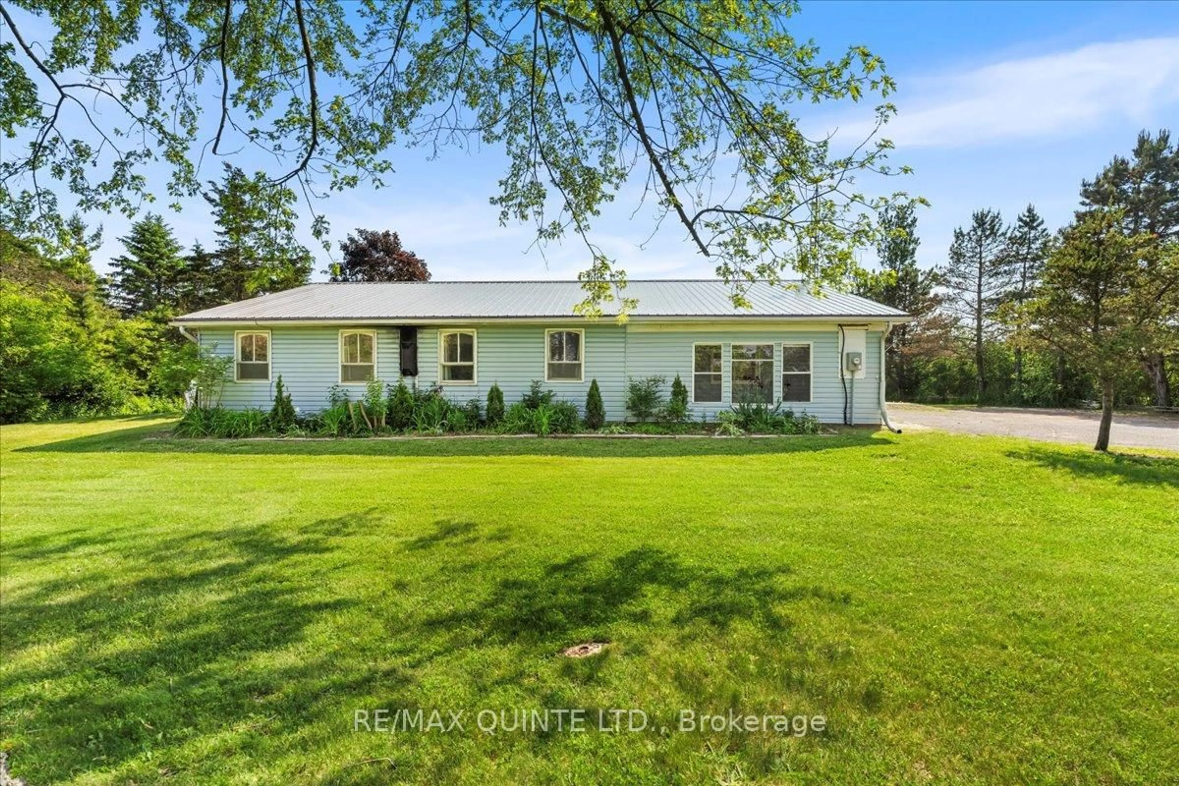 A pic from outside/outdoor area/front of a property/back of a property/a pic from drone, unknown for 20 County Road 17, Prince Edward County Ontario K0K 2T0