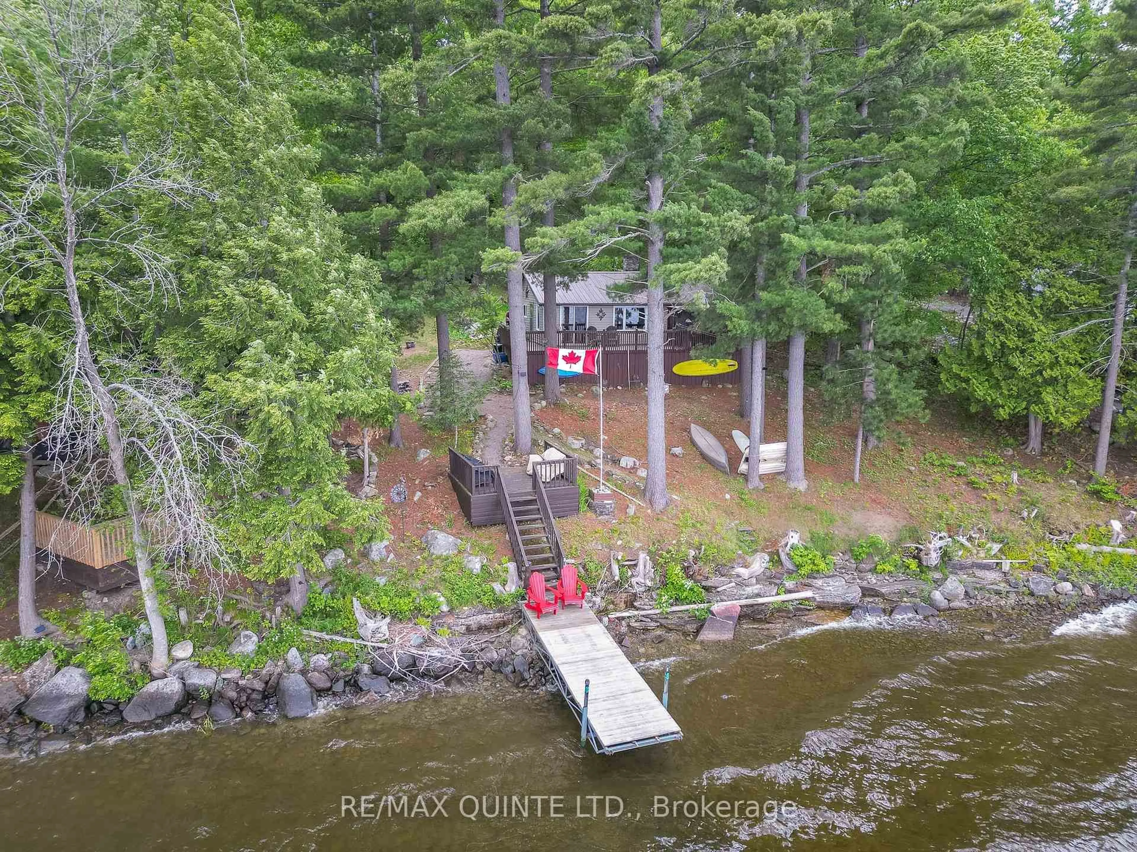 A pic from outside/outdoor area/front of a property/back of a property/a pic from drone, water/lake/river/ocean view for 44 Setter Lane, Madoc Ontario K0K 2K0