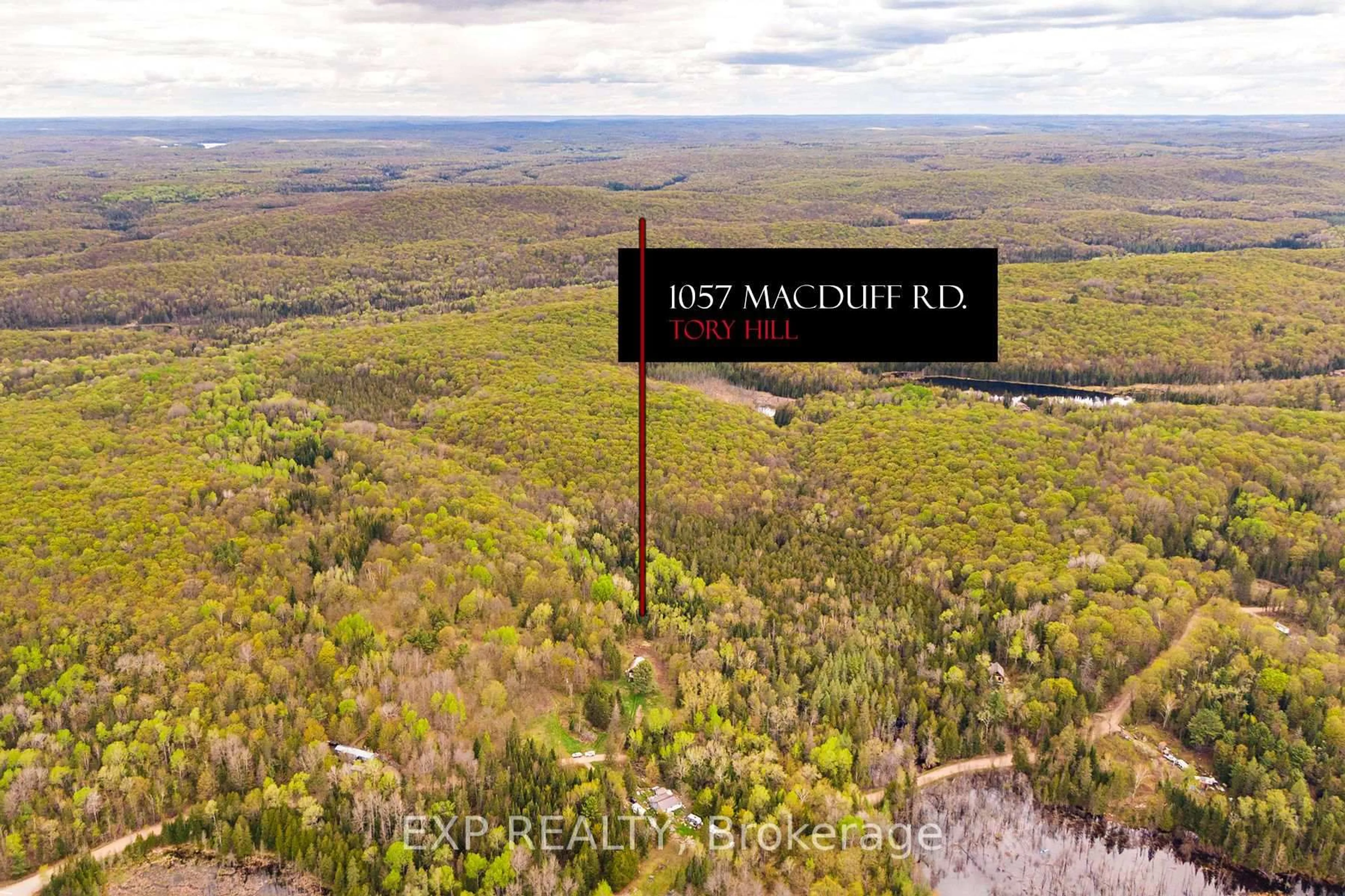 A pic from outside/outdoor area/front of a property/back of a property/a pic from drone, mountain view for 1057 Macduff Rd, Highlands East Ontario K0L 2Y0