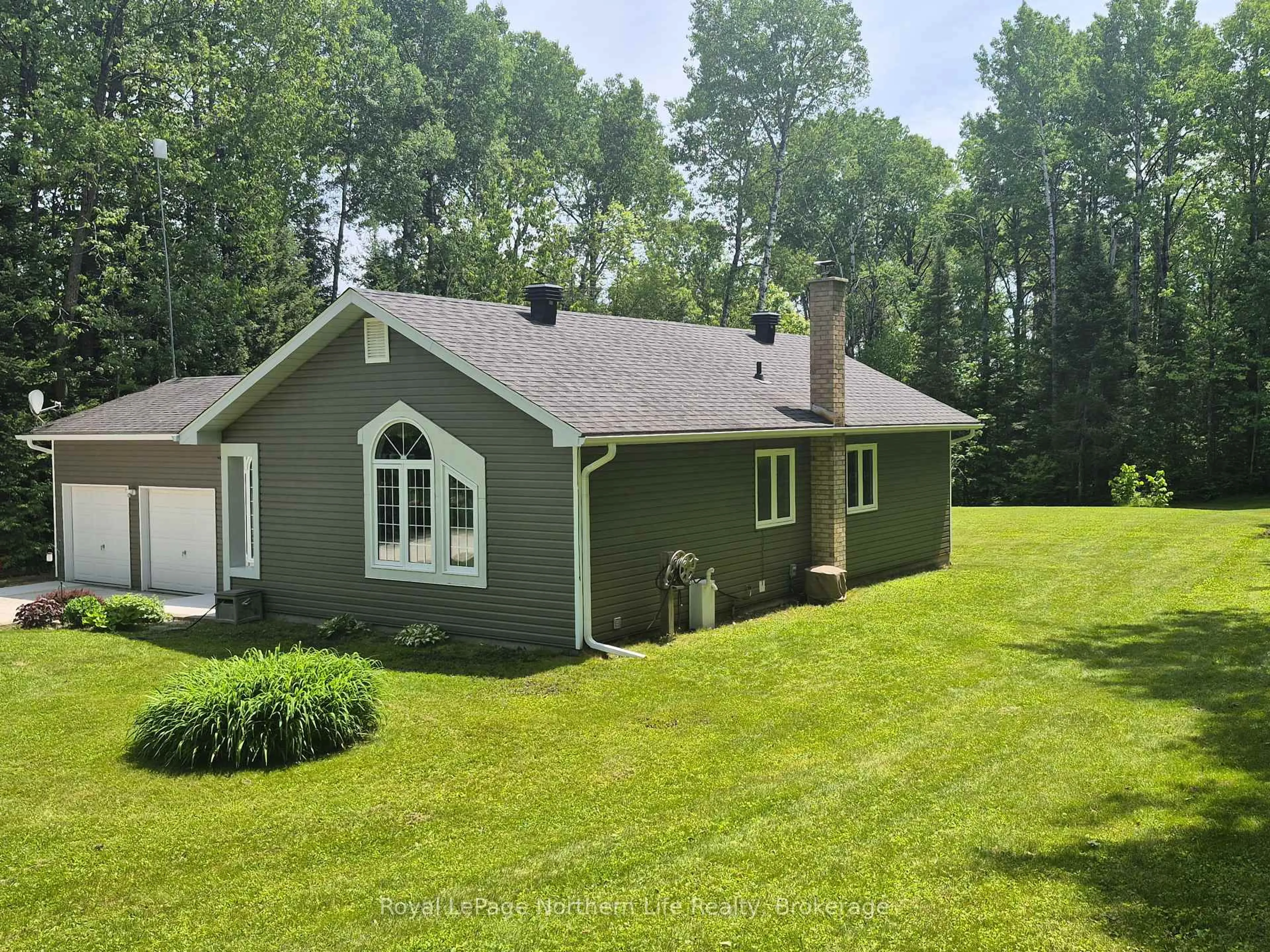 A pic from outside/outdoor area/front of a property/back of a property/a pic from drone, unknown for 1140 Von Doeler Rd, Bonfield Ontario P0H 2E0