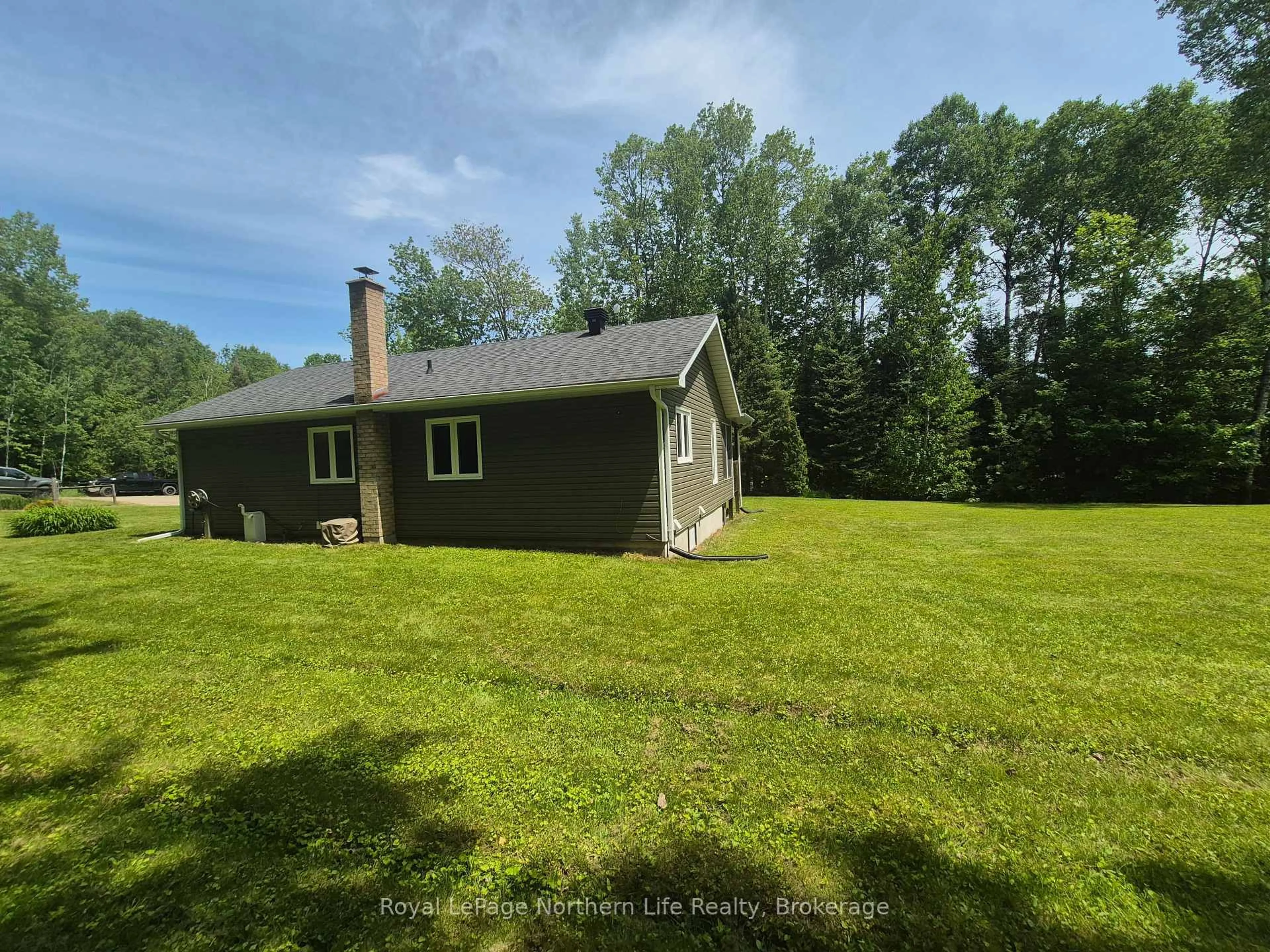 A pic from outside/outdoor area/front of a property/back of a property/a pic from drone, unknown for 1140 Von Doeler Rd, Bonfield Ontario P0H 2E0