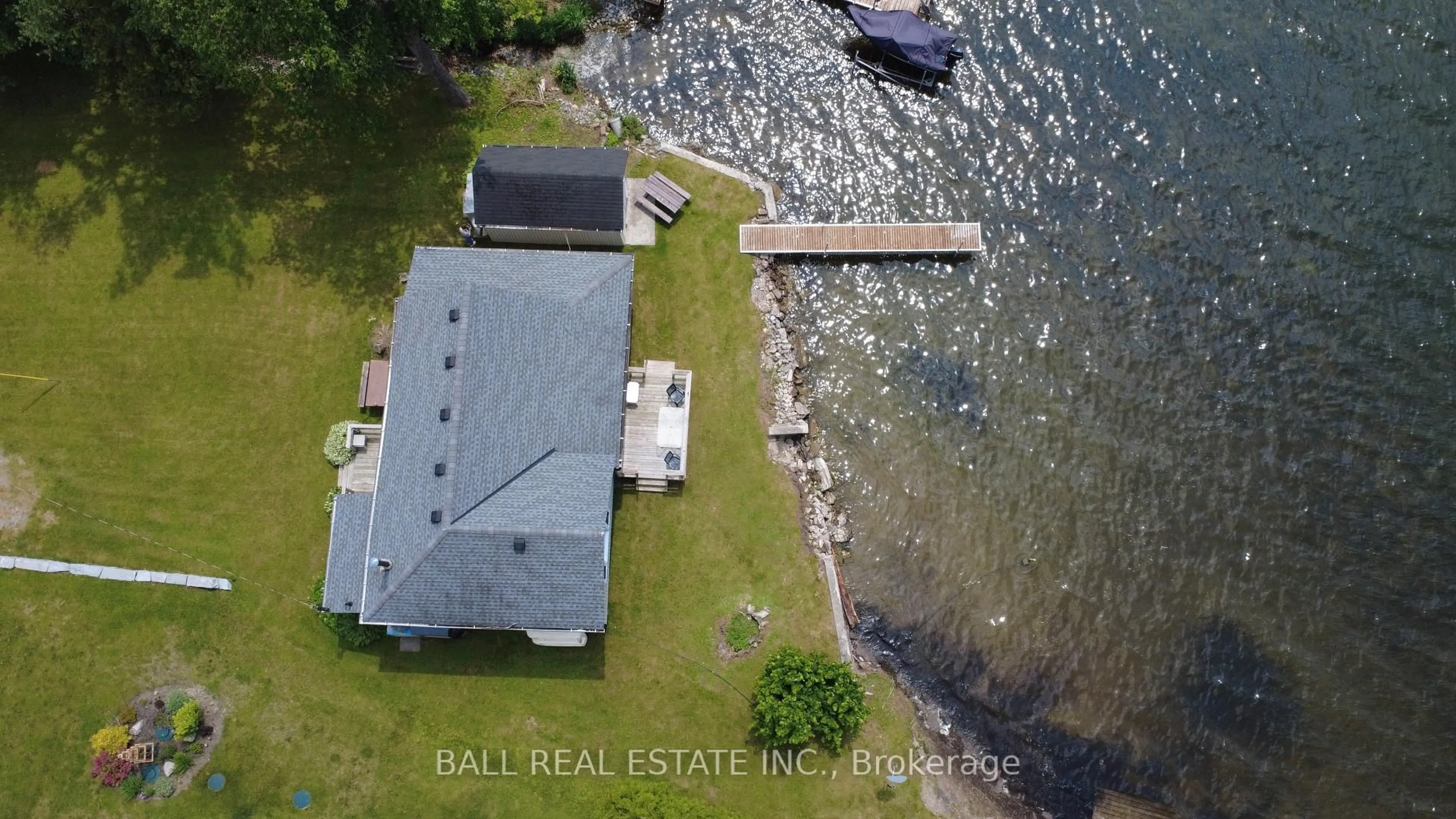 A pic from outside/outdoor area/front of a property/back of a property/a pic from drone, water/lake/river/ocean view for 654 Hatton Ave, Selwyn Ontario K0L 1H0