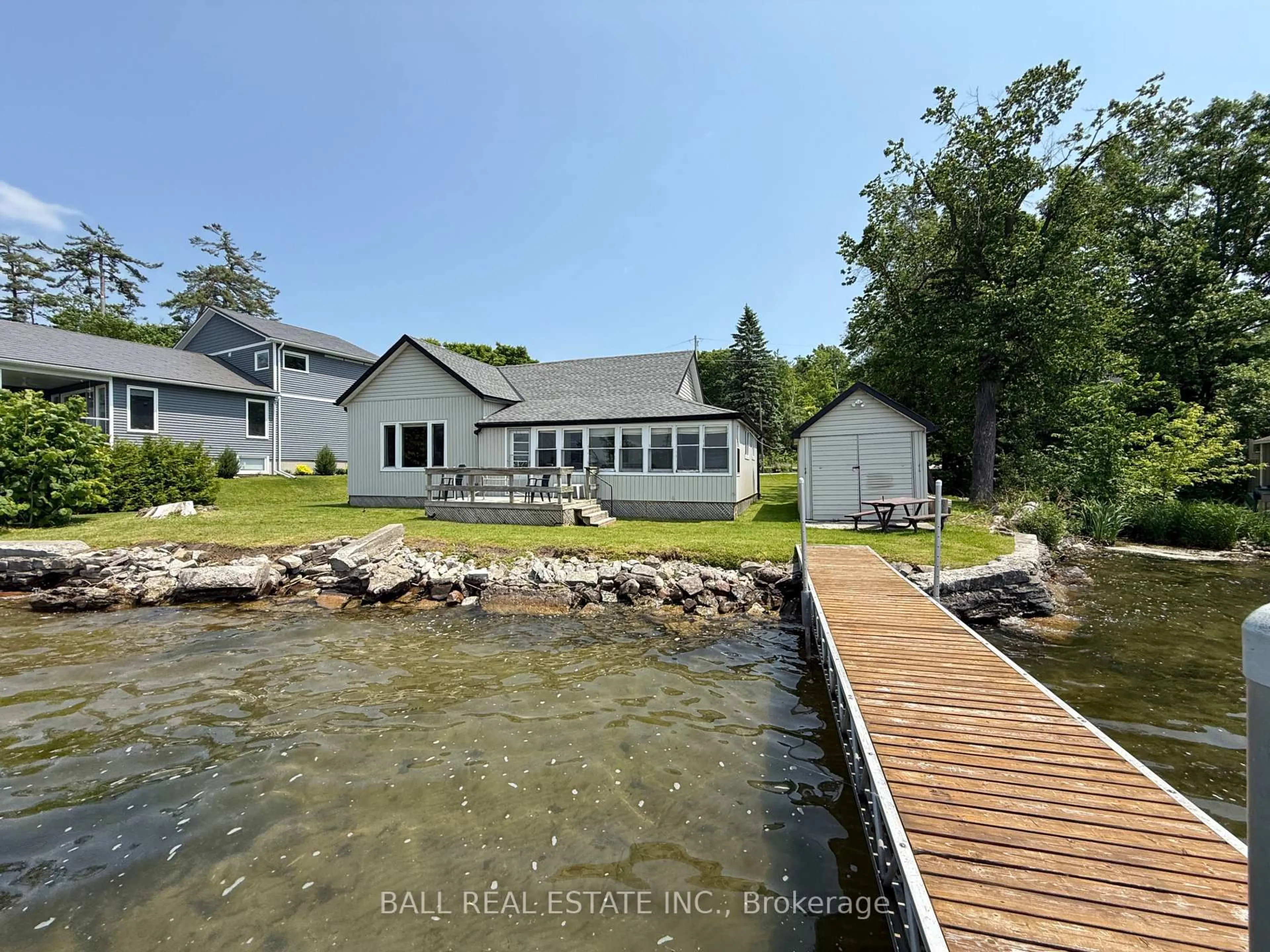 A pic from outside/outdoor area/front of a property/back of a property/a pic from drone, water/lake/river/ocean view for 654 Hatton Ave, Selwyn Ontario K0L 1H0