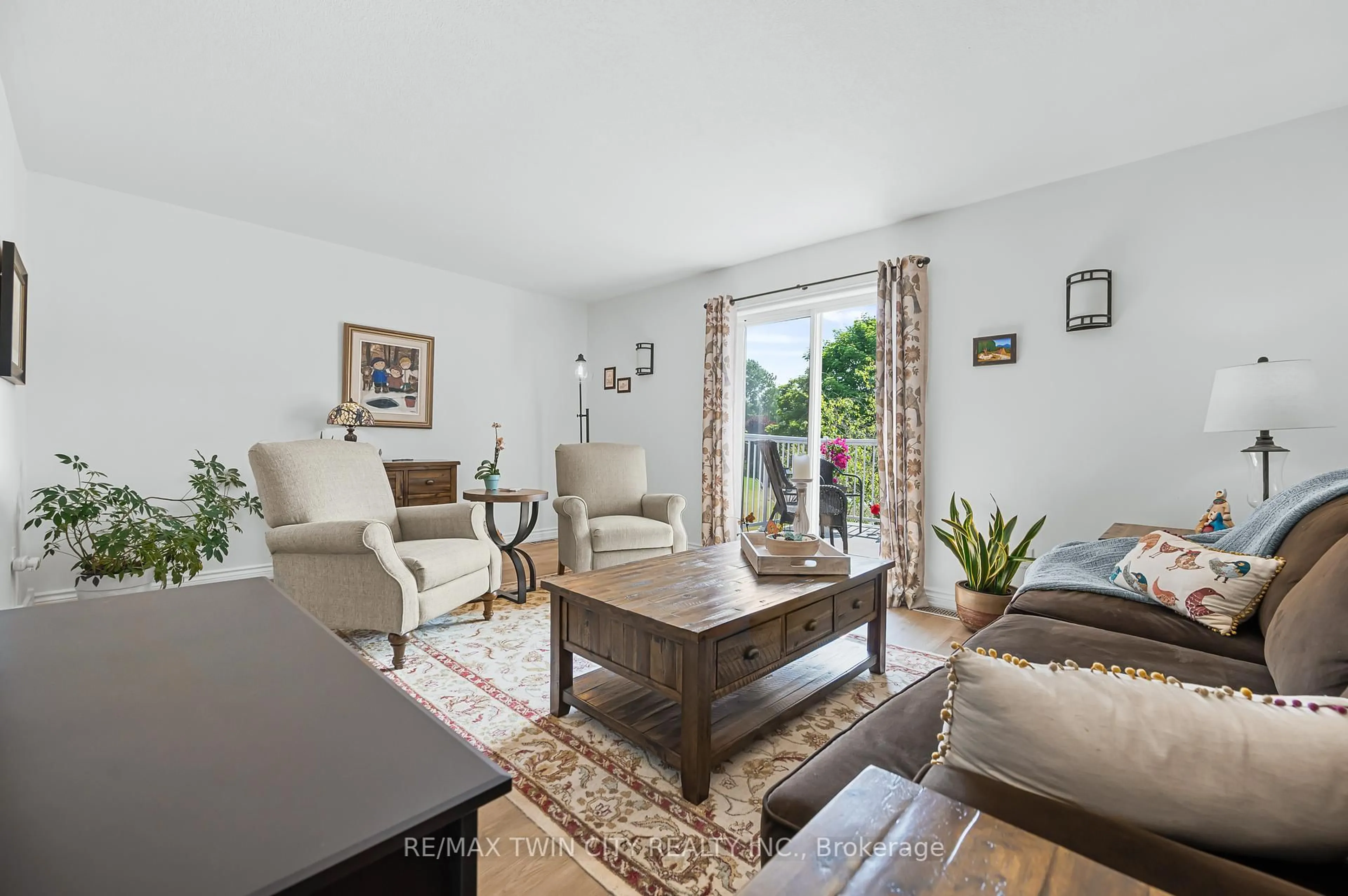 Living room with furniture, unknown for 301 Carlow Rd #18, Central Elgin Ontario N5L 1B7