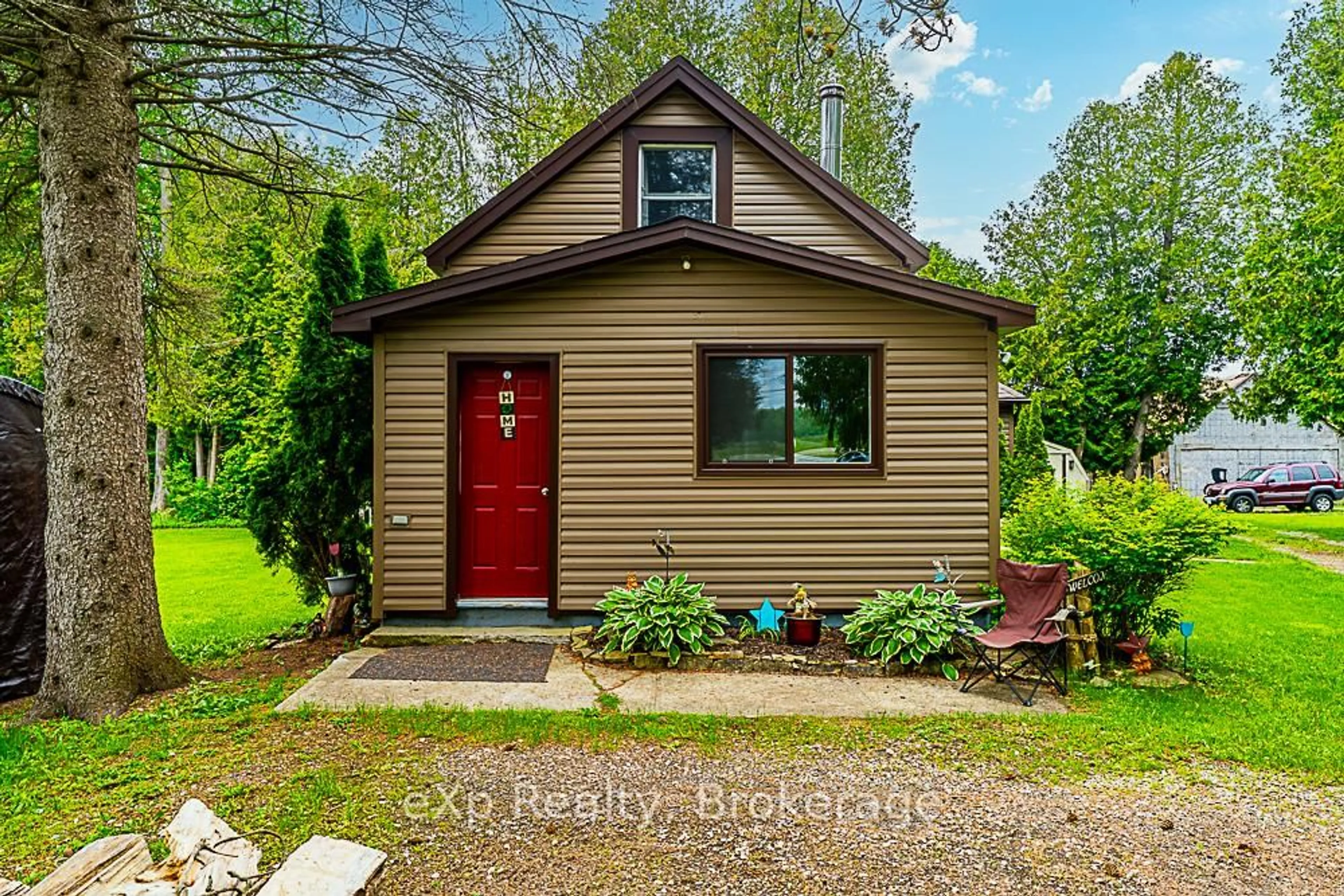 A pic from outside/outdoor area/front of a property/back of a property/a pic from drone, street for 1201 HIGHWAY 6, South Bruce Peninsula Ontario N0H 2T0