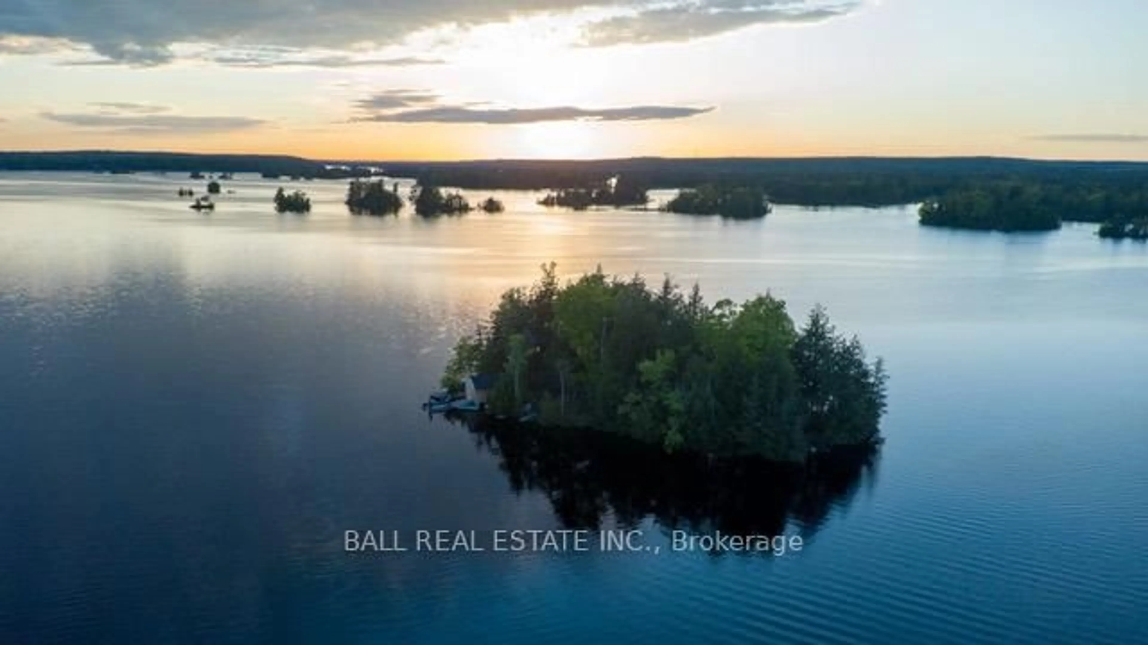 A pic from outside/outdoor area/front of a property/back of a property/a pic from drone, water/lake/river/ocean view for 9 Island 4, Selwyn Ontario K0L 2H0