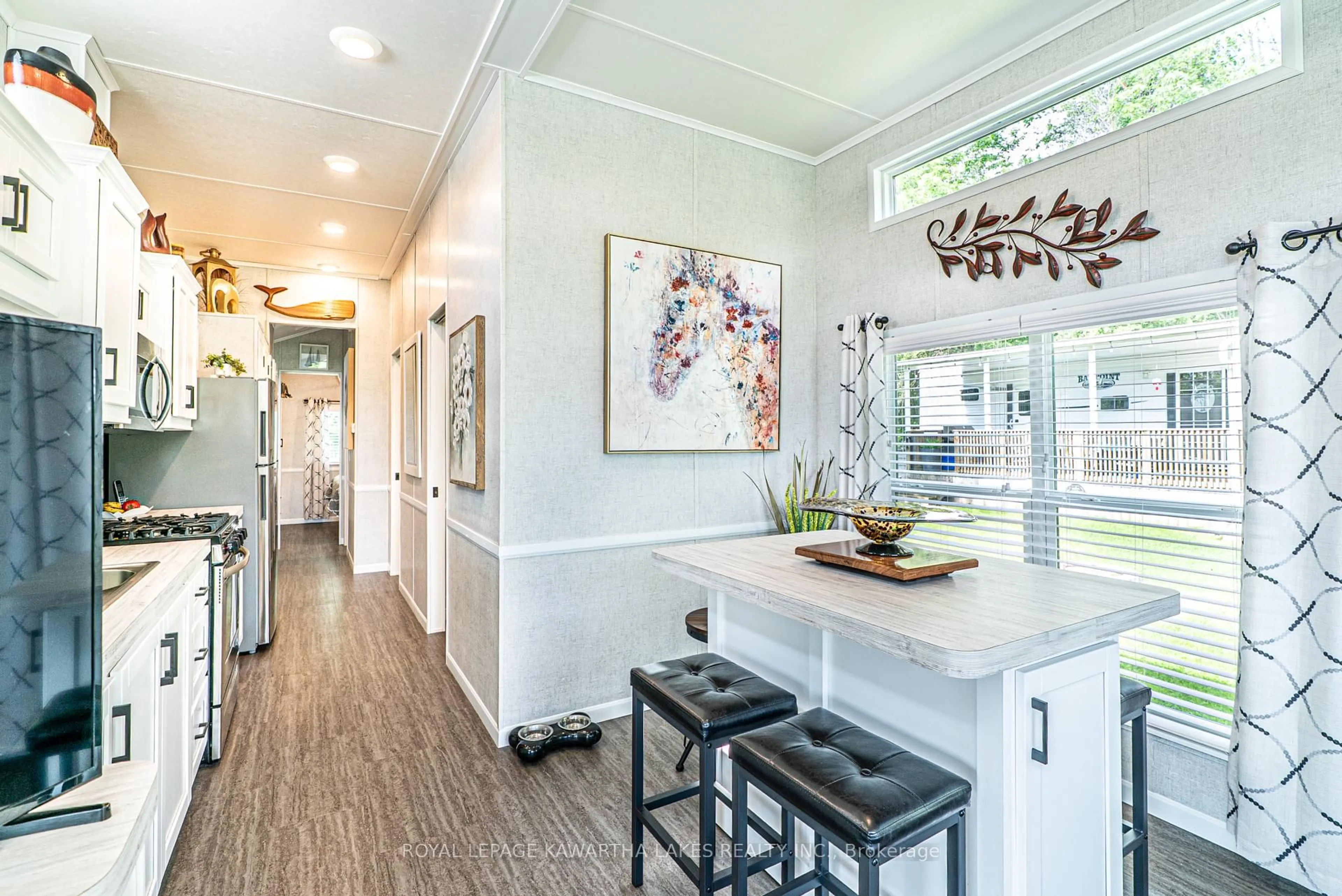 Open concept kitchen, ceramic/tile floor for 46 Alpine St, Kawartha Lakes Ontario K9V 4R1