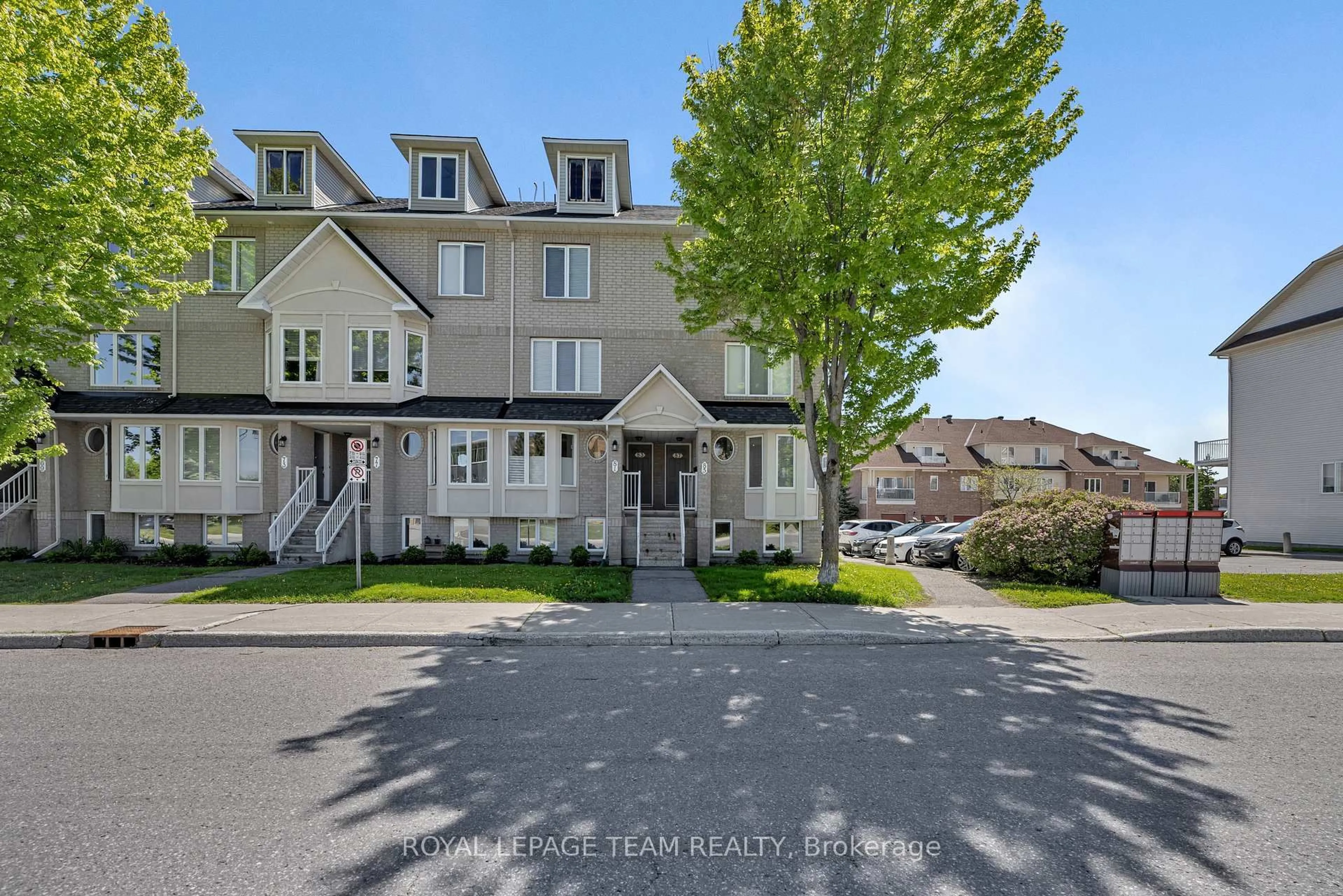 A pic from outside/outdoor area/front of a property/back of a property/a pic from drone, street for 85 Cresthaven Dr #6, Ottawa Ontario K2G 6T9
