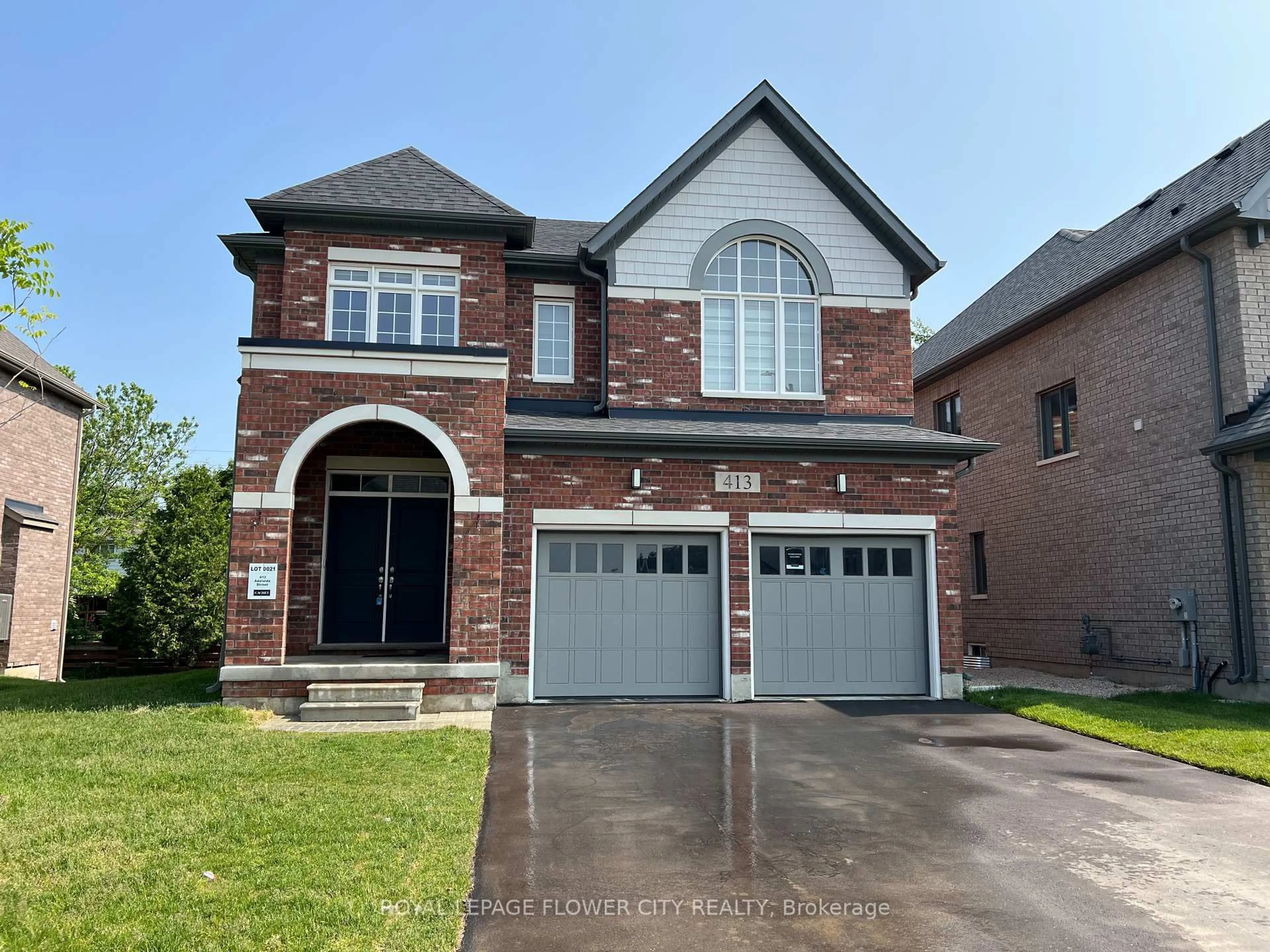 Home with brick exterior material, street for 413 Adelaide St, Wellington North Ontario N0G 1A0