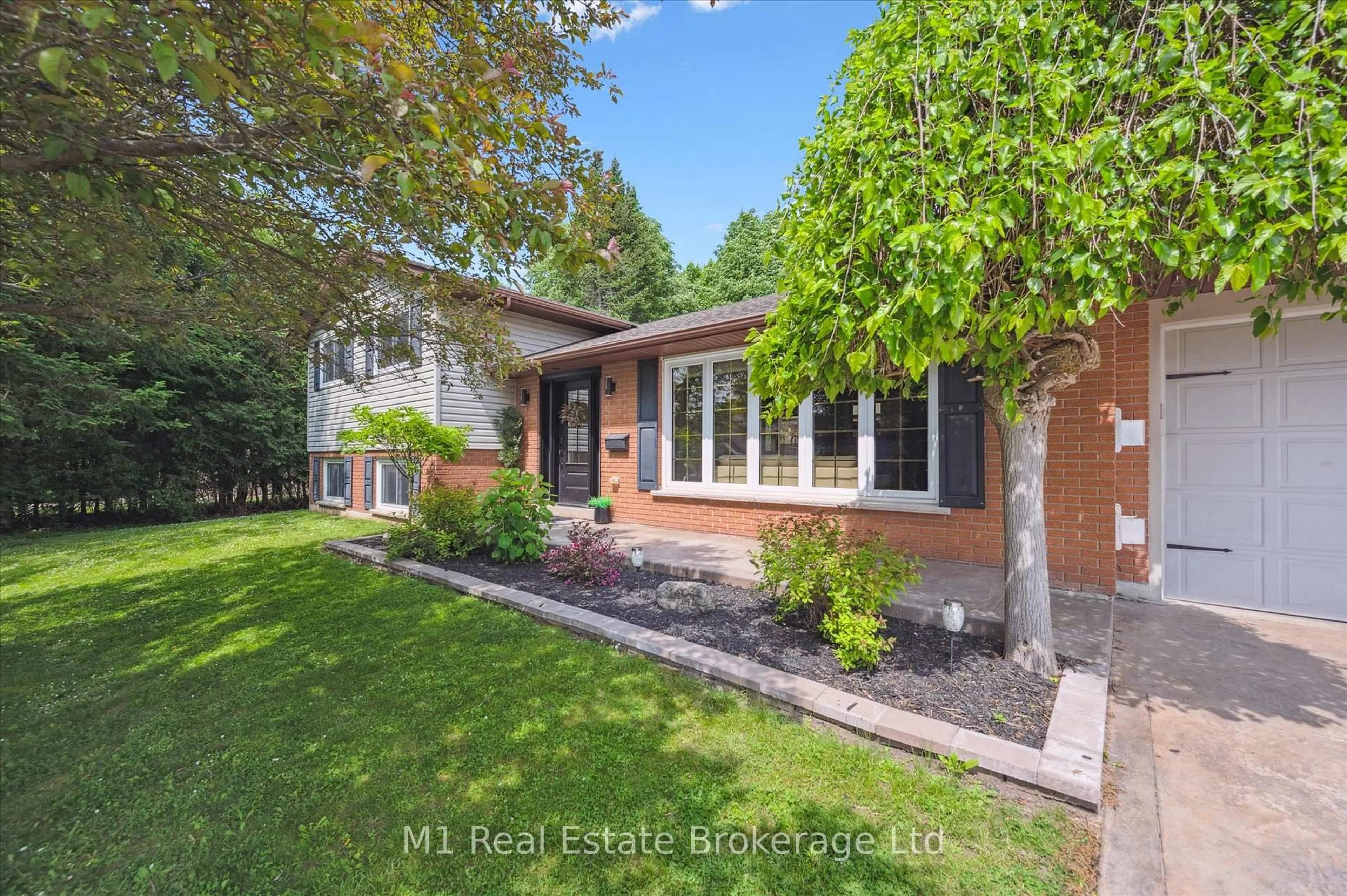 Home with brick exterior material, street for 765 Bon Accord St, Centre Wellington Ontario N1M 3A2