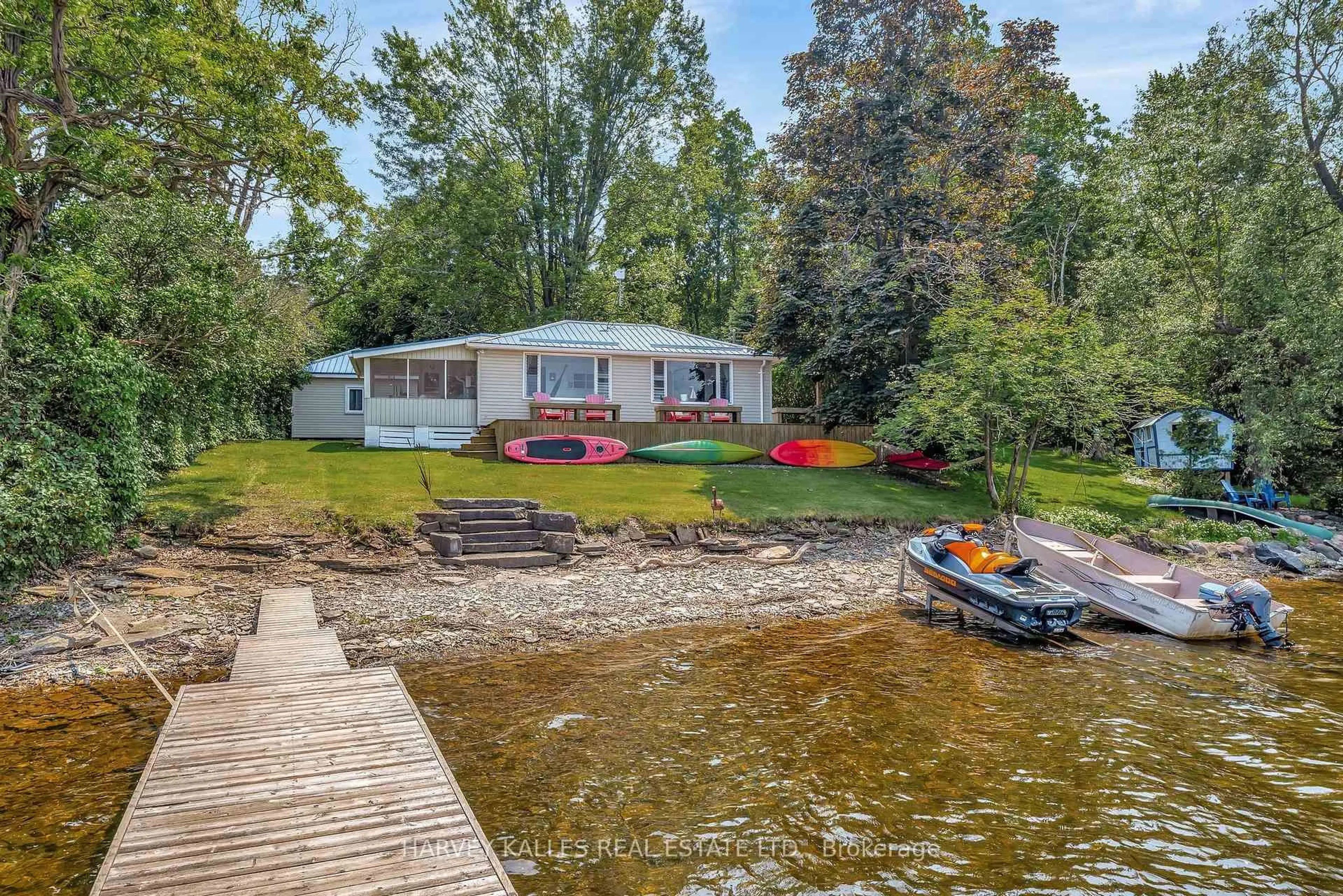 A pic from outside/outdoor area/front of a property/back of a property/a pic from drone, water/lake/river/ocean view for 11856B Loyalist Pkwy, Prince Edward County Ontario K0K 2T0