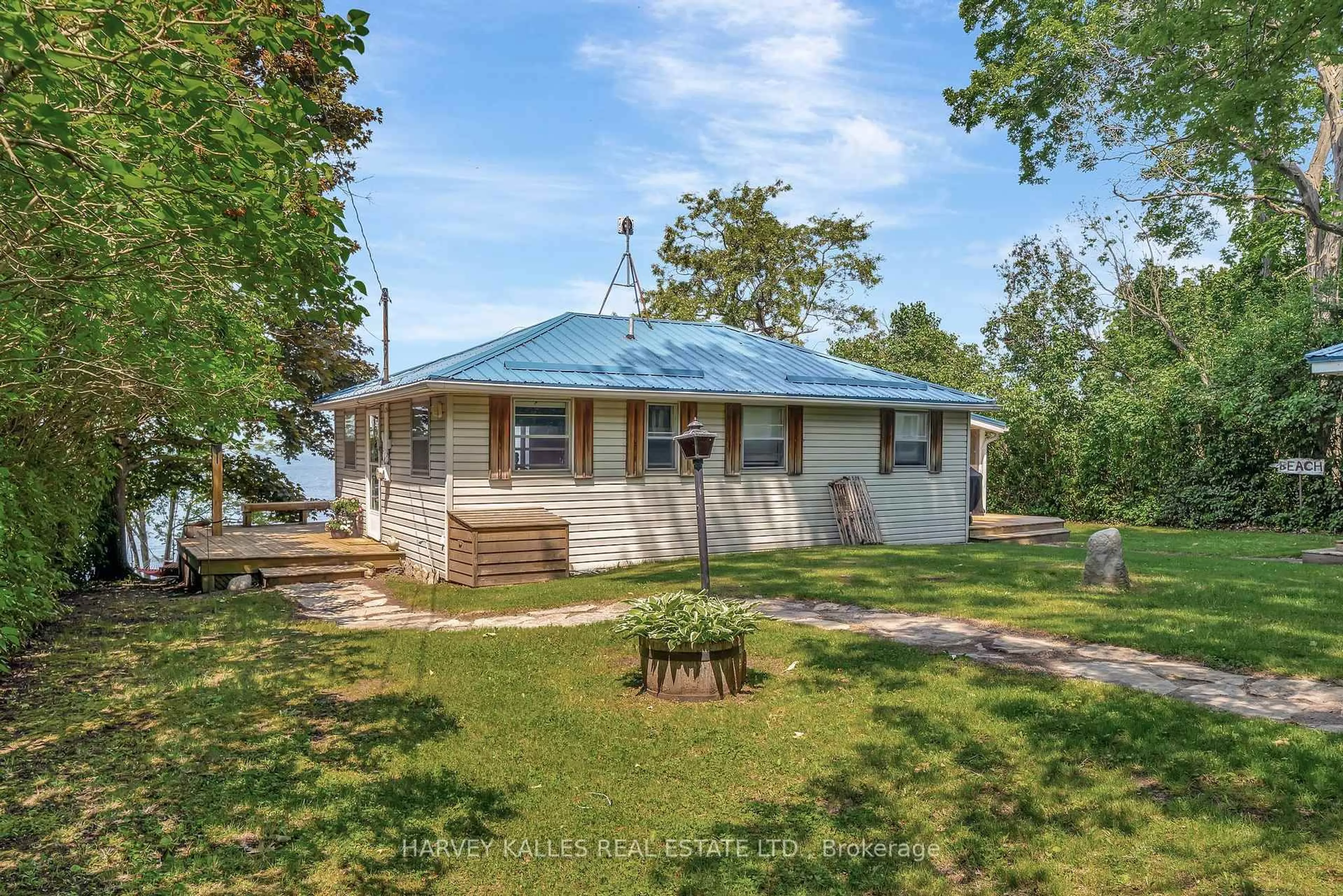 A pic from outside/outdoor area/front of a property/back of a property/a pic from drone, unknown for 11856B Loyalist Pkwy, Prince Edward County Ontario K0K 2T0