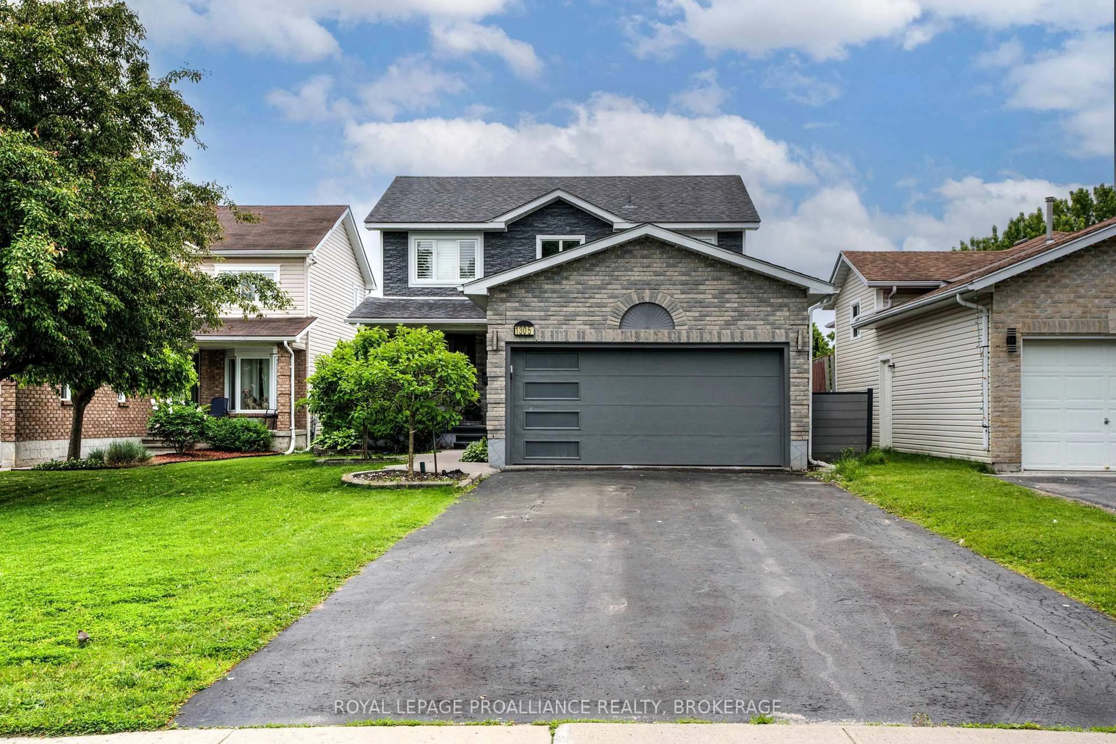 Home with vinyl exterior material, street for 1305 Fisher Cres, Kingston Ontario K7M 8T2