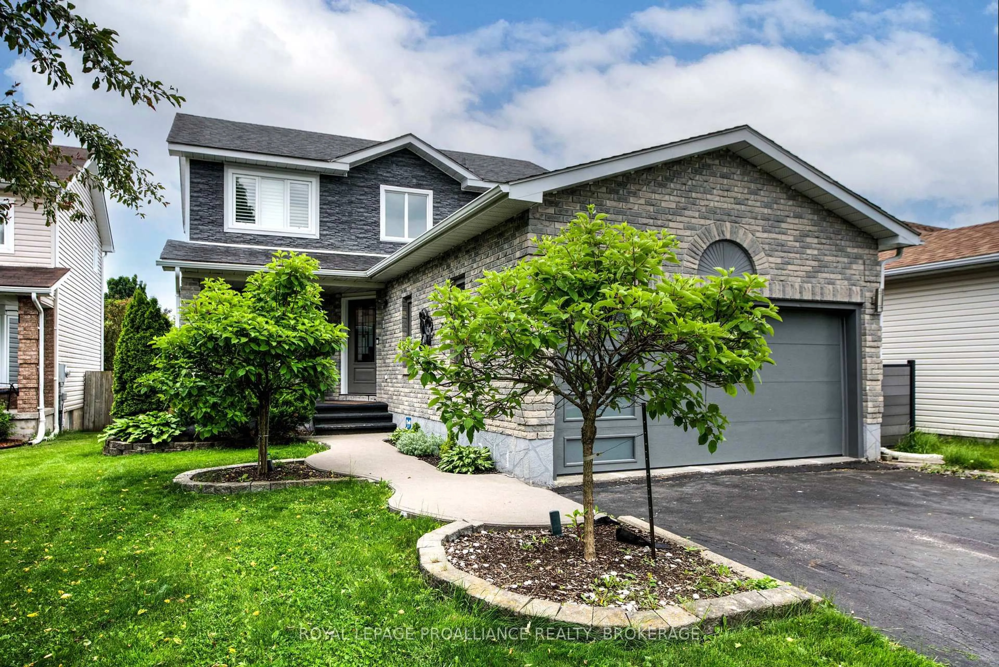 Home with brick exterior material, street for 1305 Fisher Cres, Kingston Ontario K7M 8T2