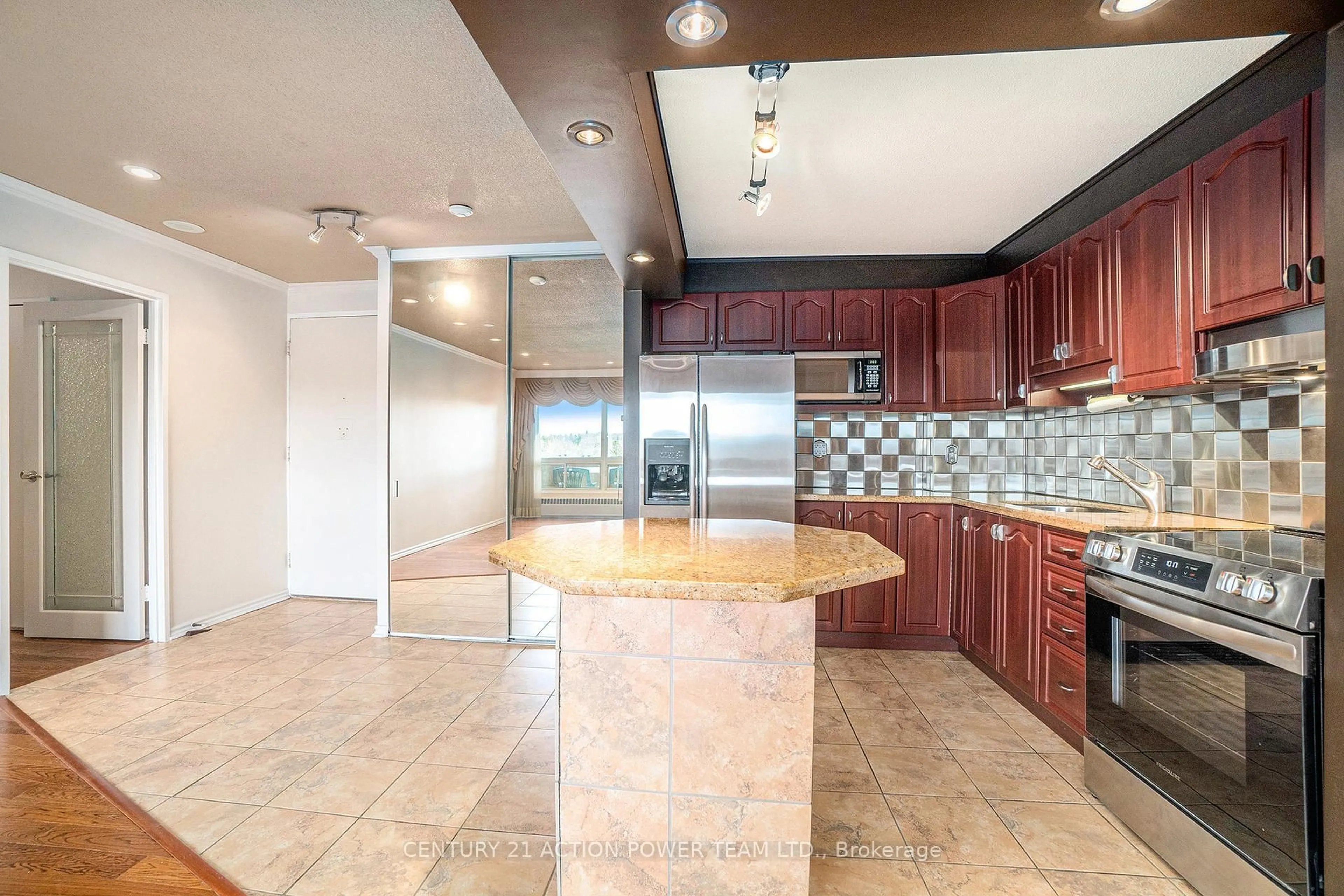 Open concept kitchen, ceramic/tile floor for 915 Elmsmere Rd #707, Ottawa Ontario K1J 8H8