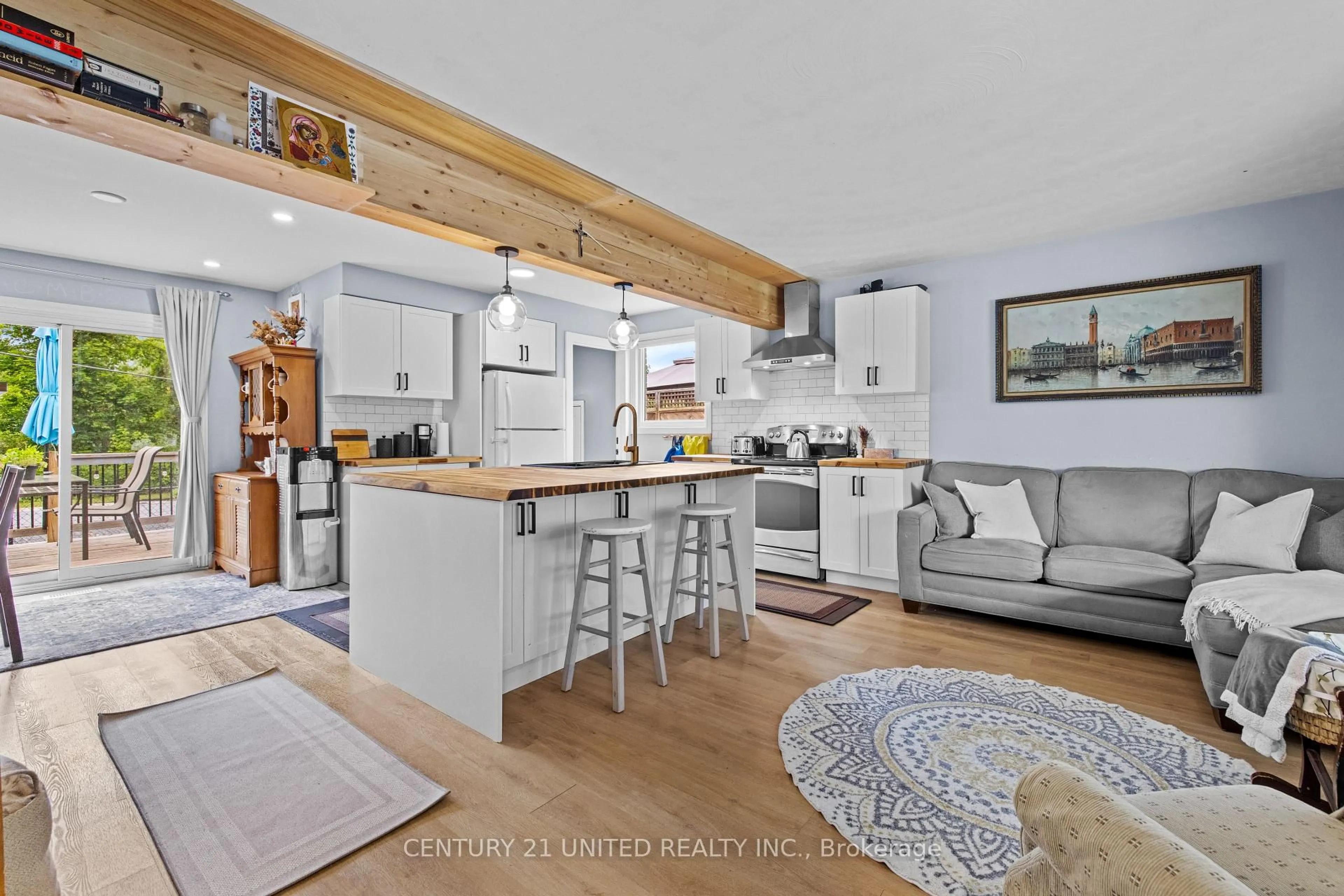 Open concept kitchen, wood/laminate floor for 1105 Barnardo Ave, Peterborough North Ontario K9H 5W9