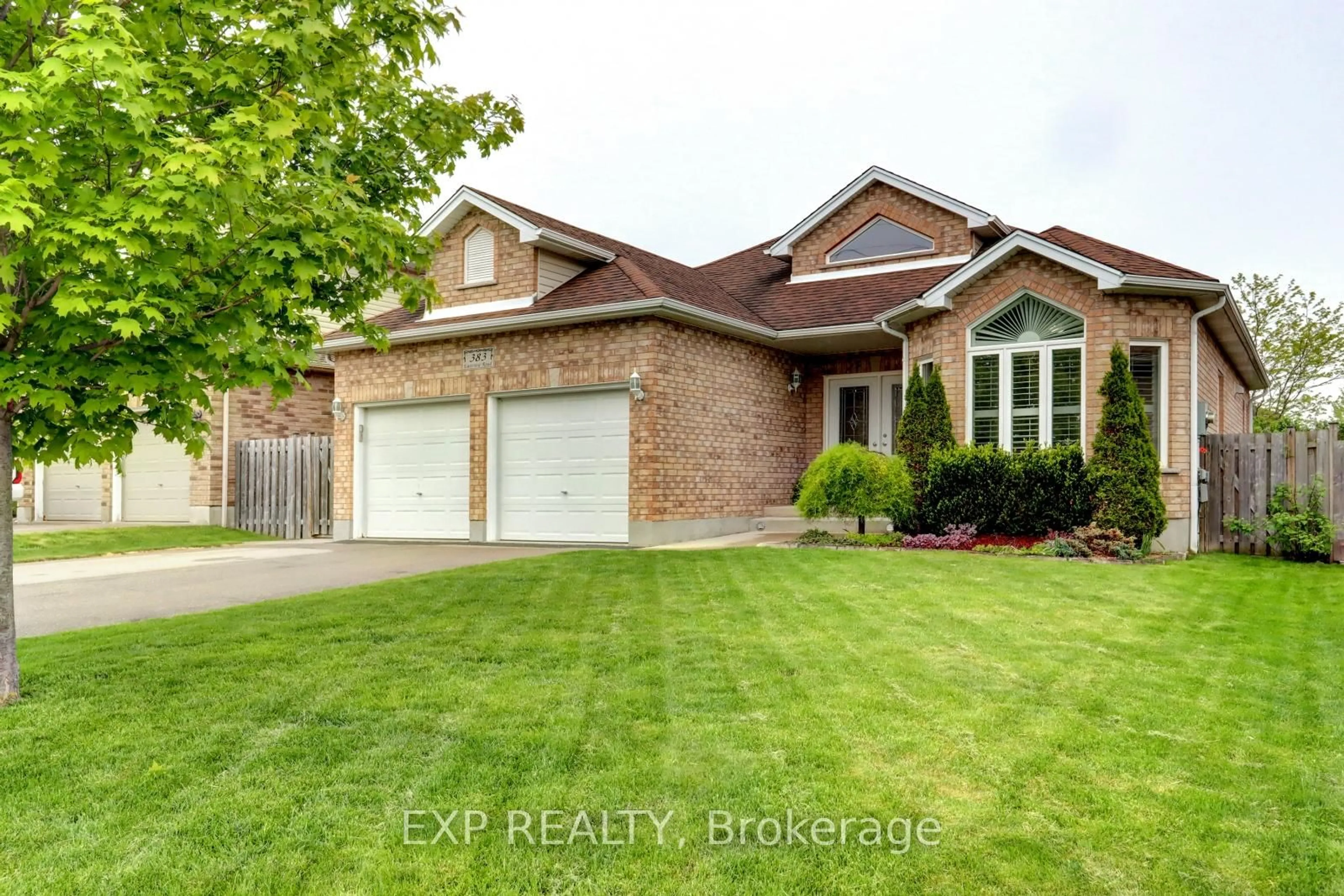 Home with brick exterior material, street for 383 Eastview Rd, Guelph Ontario N1E 0C8