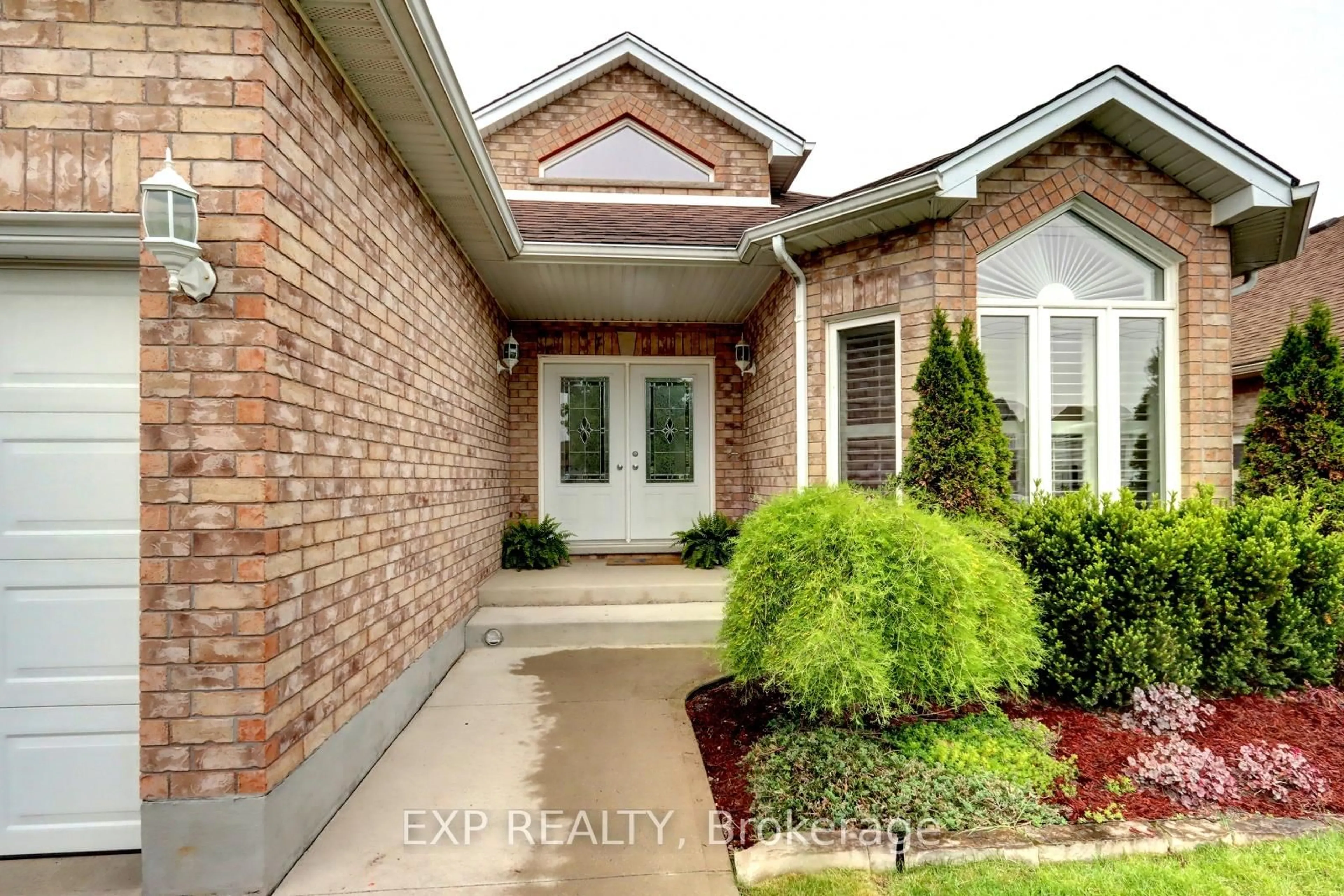 Home with brick exterior material, street for 383 Eastview Rd, Guelph Ontario N1E 0C8