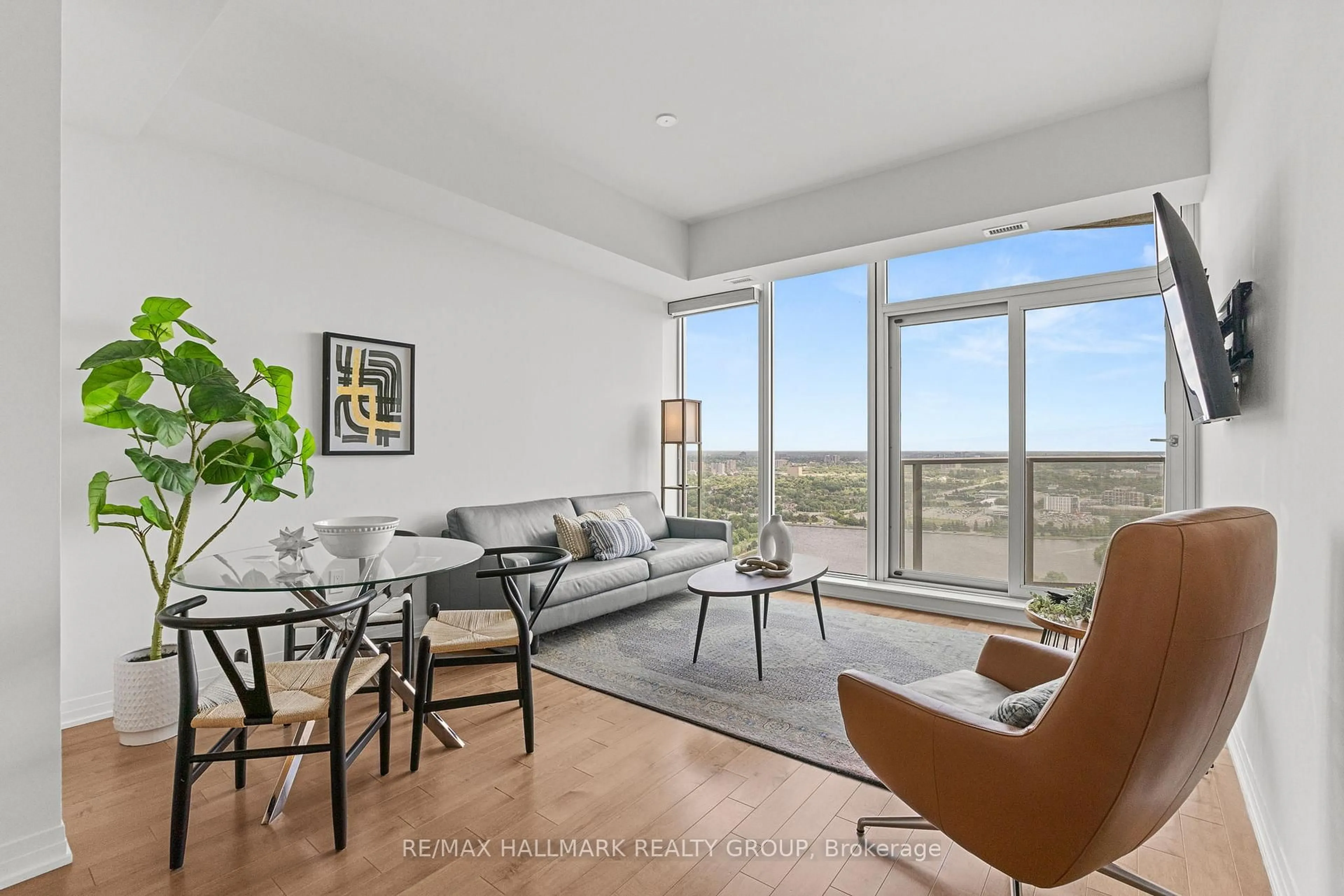 Living room with furniture, unknown for 805 Carling Ave #4005, Ottawa Ontario K1S 5W9