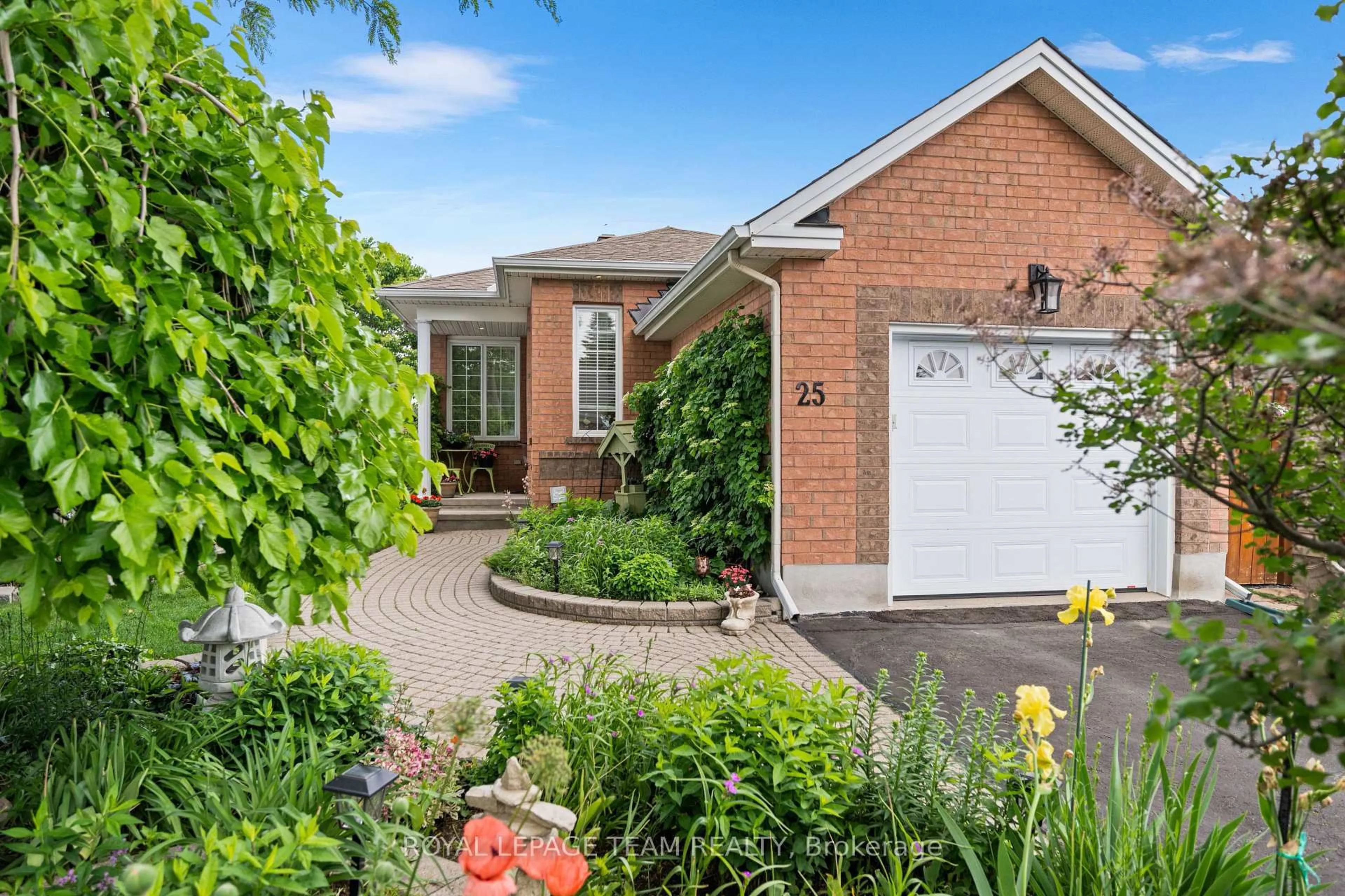 Home with brick exterior material, street for 25 Trump Ave, Ottawa Ontario K2C 4A7