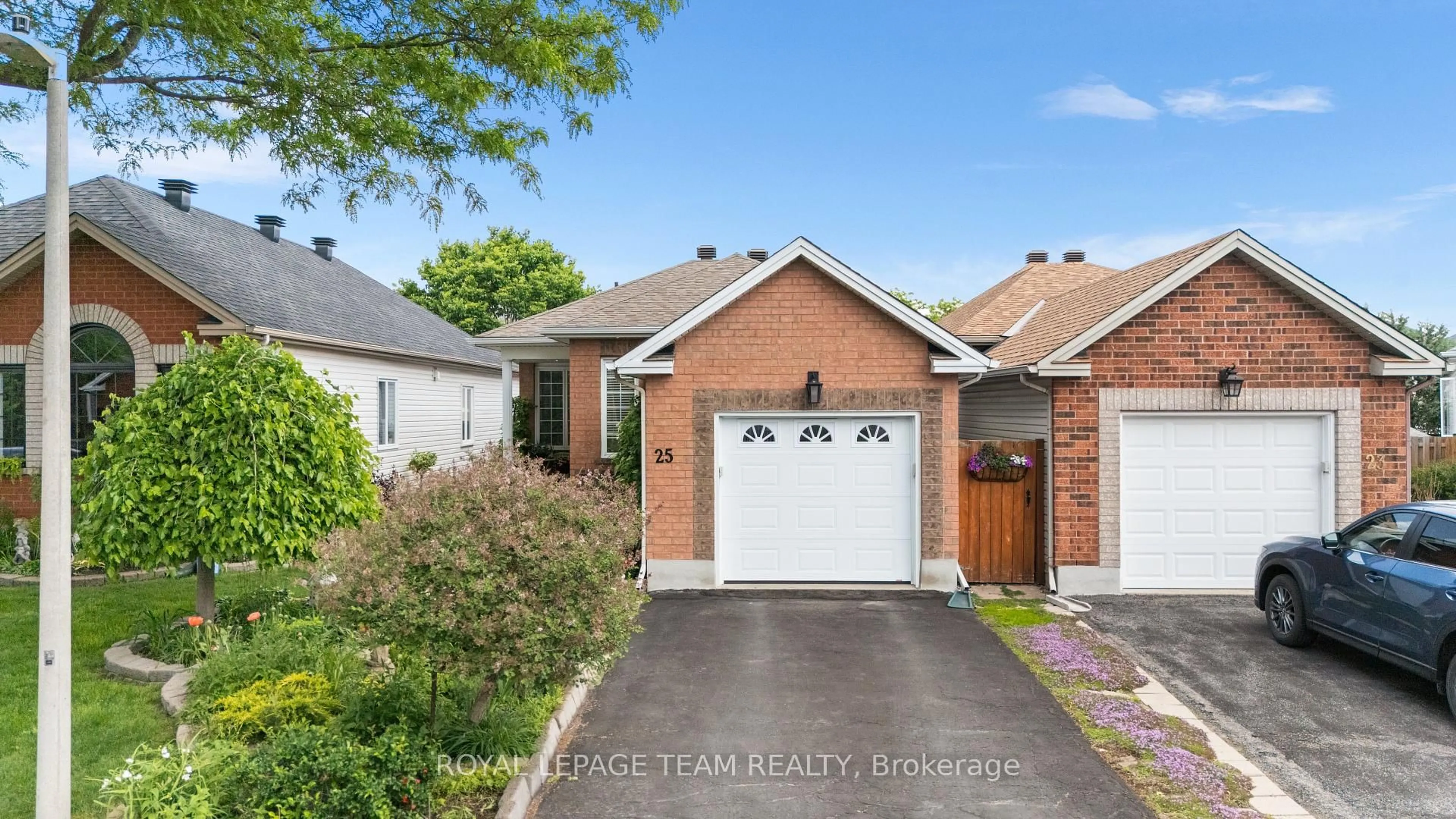 Home with brick exterior material, street for 25 Trump Ave, Ottawa Ontario K2C 4A7