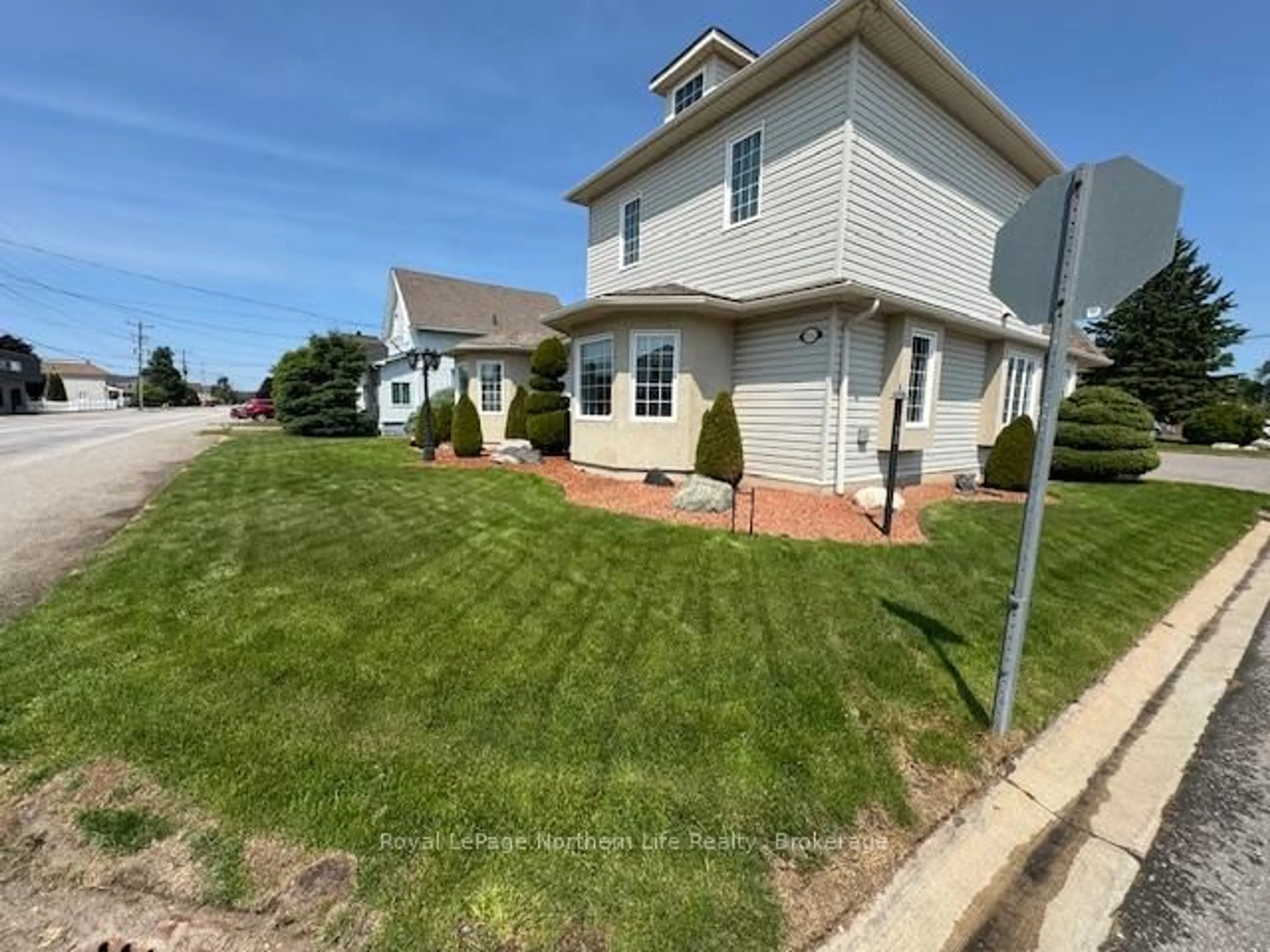 A pic from outside/outdoor area/front of a property/back of a property/a pic from drone, street for 218 Nipissing St, West Nipissing Ontario P2B 1K3
