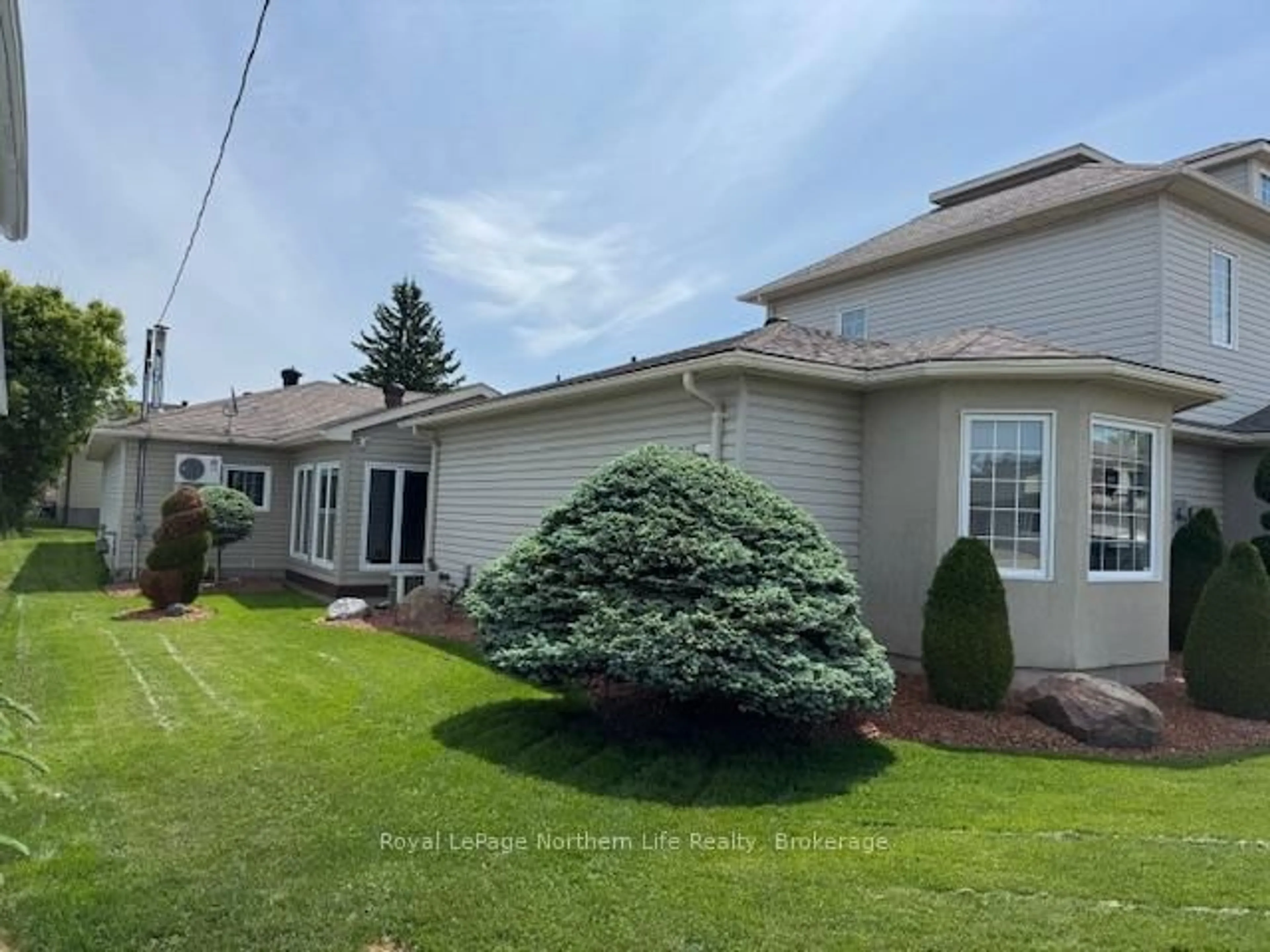Home with vinyl exterior material, water/lake/river/ocean view for 218 Nipissing St, West Nipissing Ontario P2B 1K3