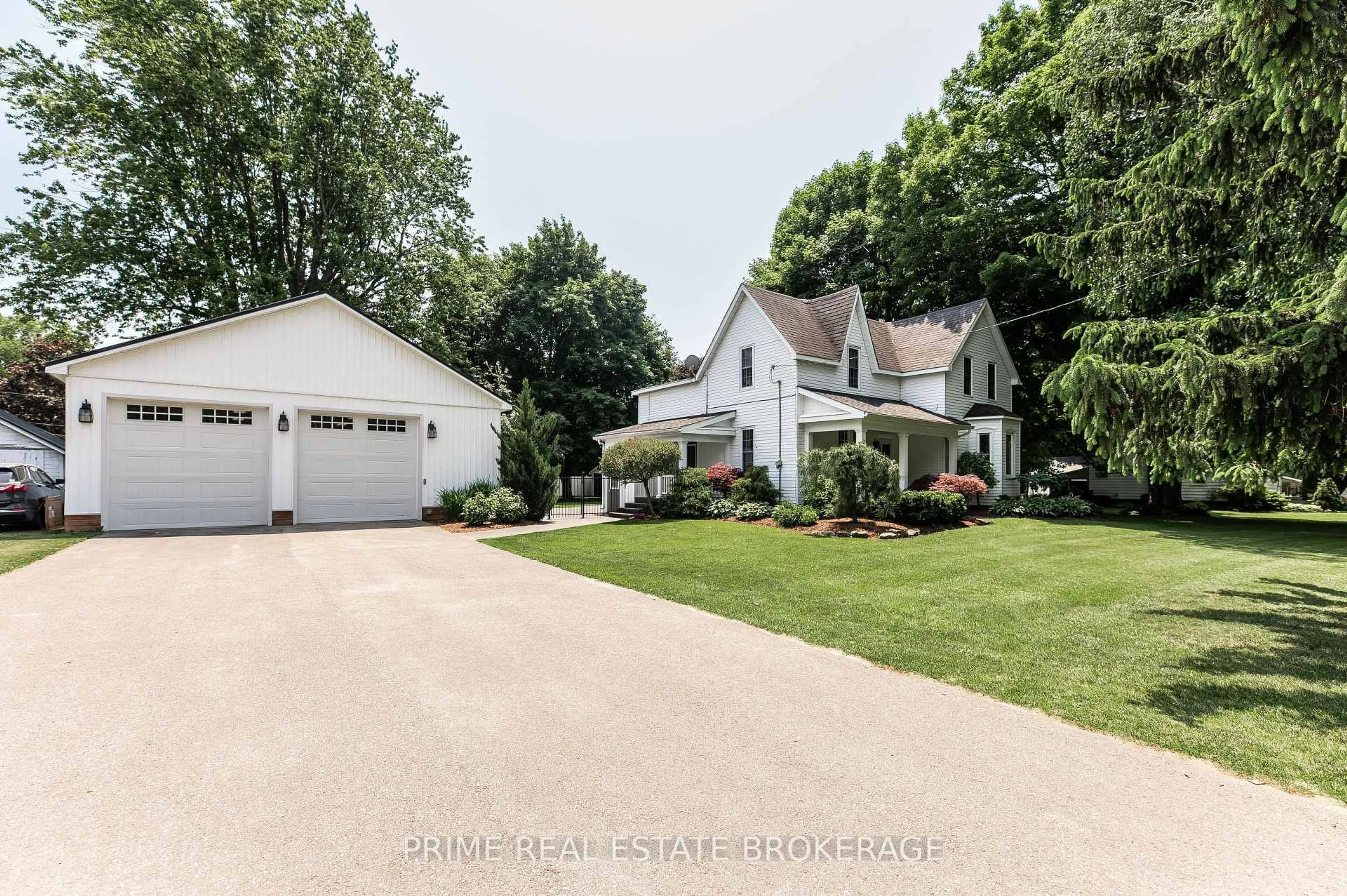 A pic from outside/outdoor area/front of a property/back of a property/a pic from drone, street for 202 Queens St, West Elgin Ontario N0L 2C0