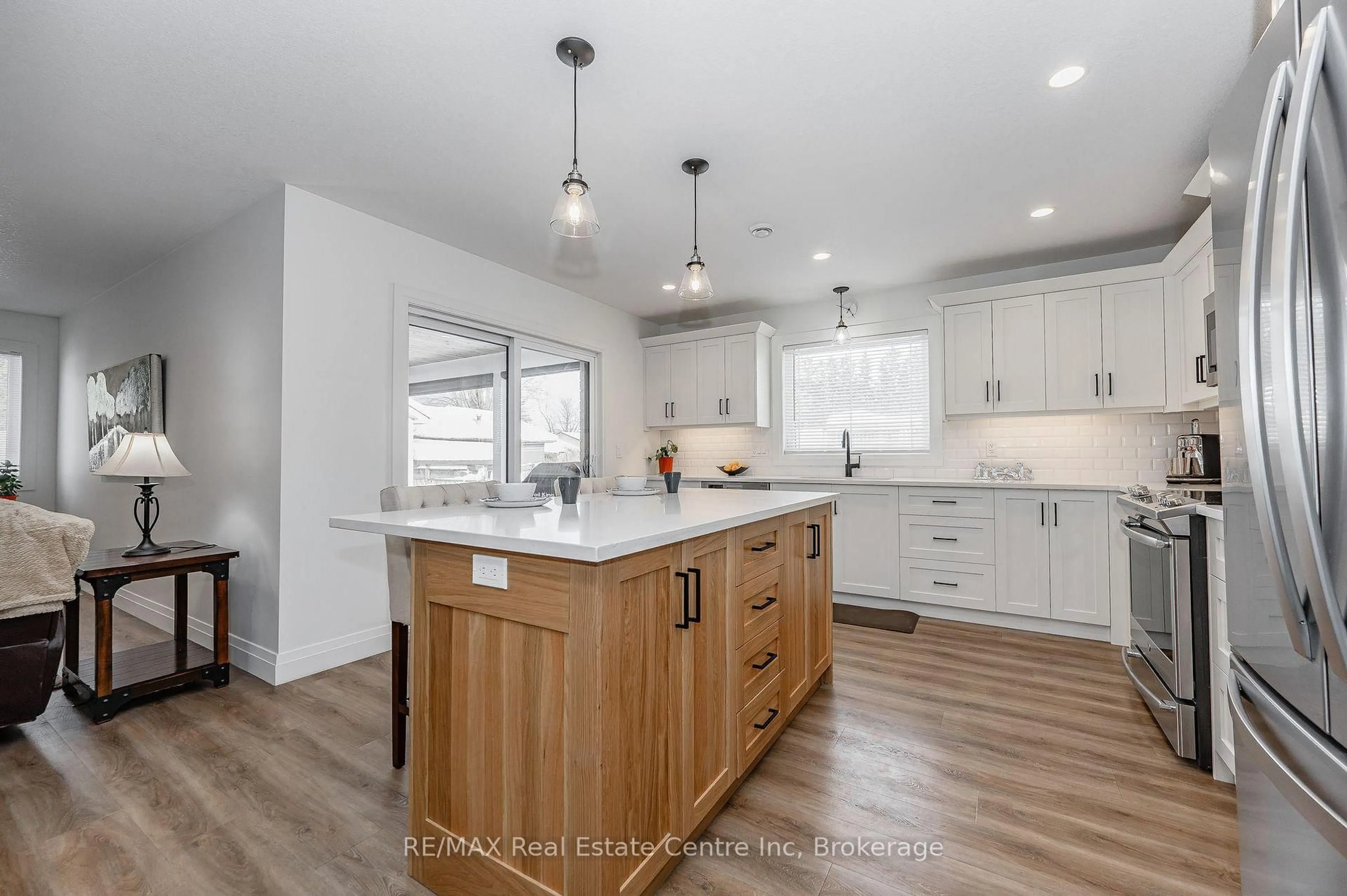 Open concept kitchen, wood/laminate floor for 635 King St, Minto Ontario N0G 2P0