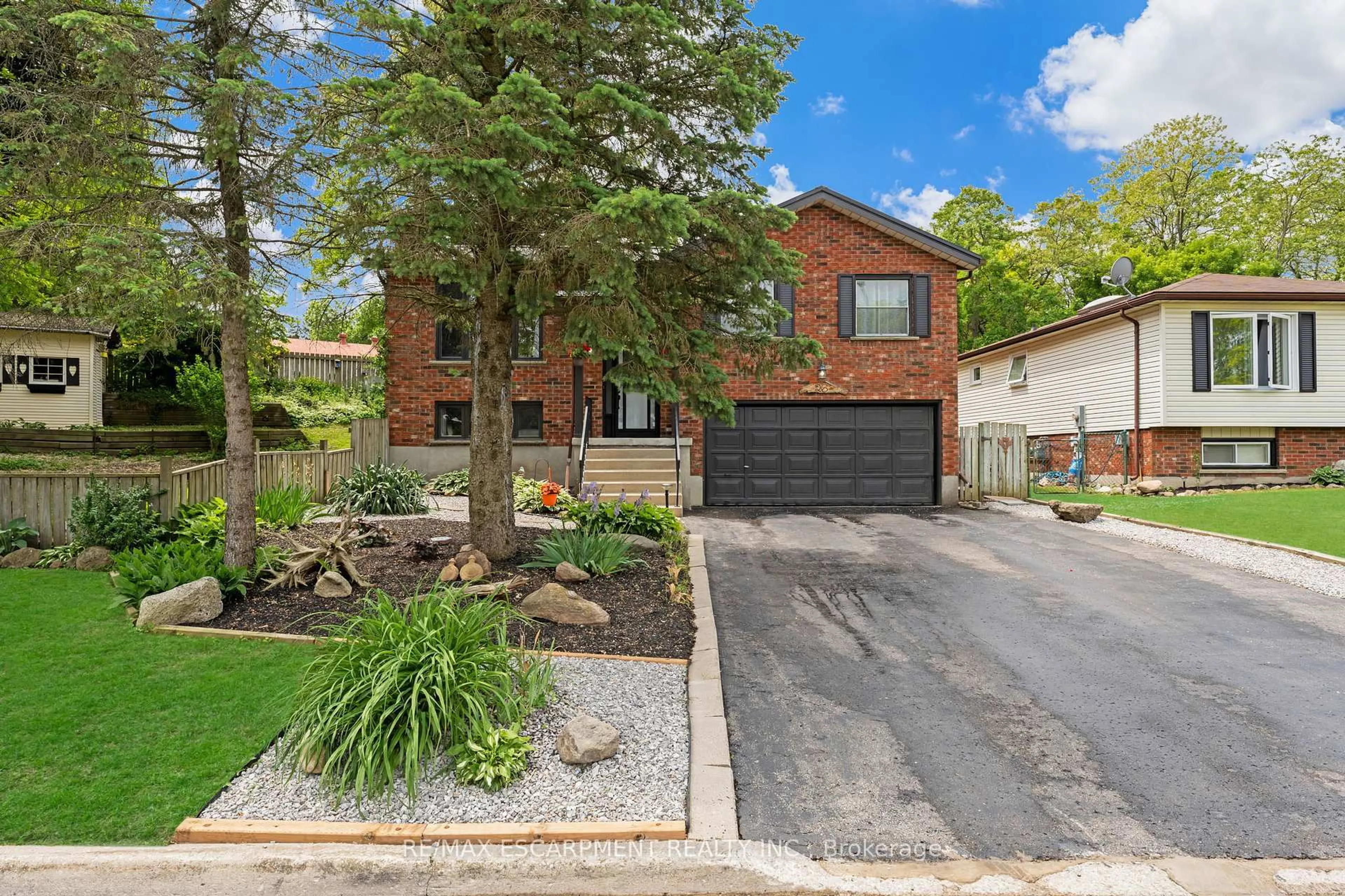 Home with brick exterior material, street for 26 Turner Dr, Norfolk Ontario N3Y 5G2