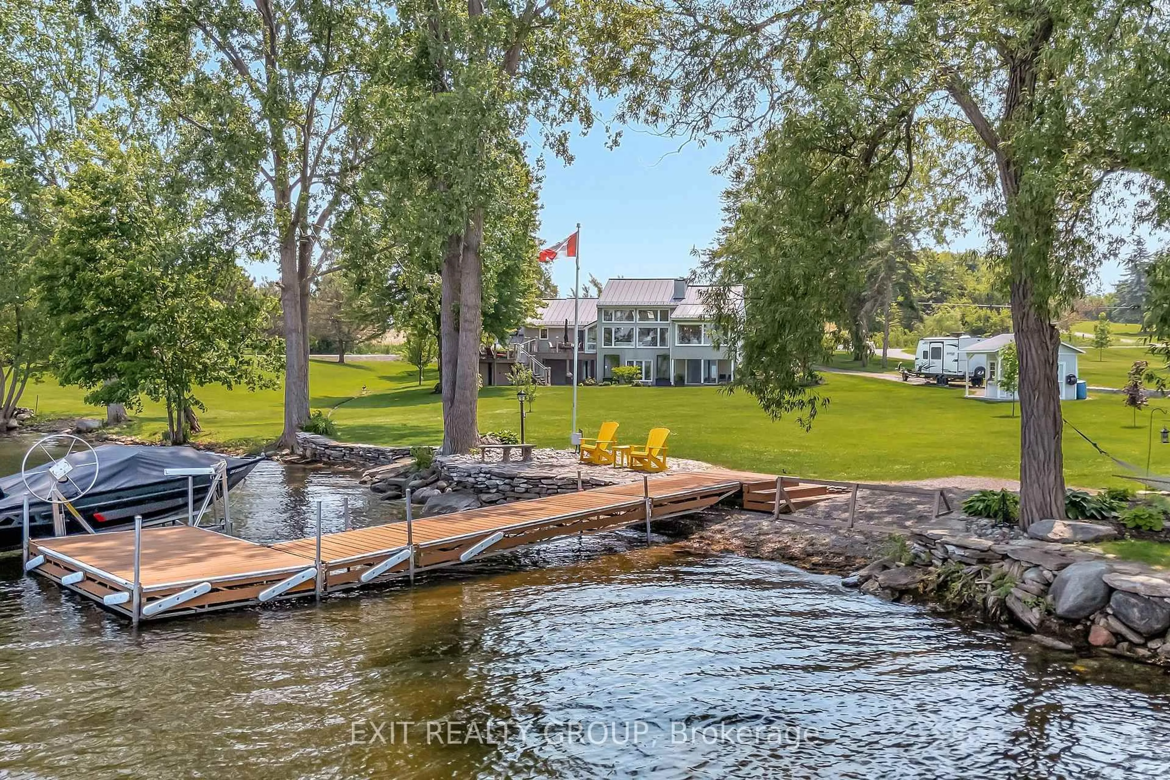 A pic from outside/outdoor area/front of a property/back of a property/a pic from drone, water/lake/river/ocean view for 652 County Rd 3, Prince Edward County Ontario K8N 4Z1