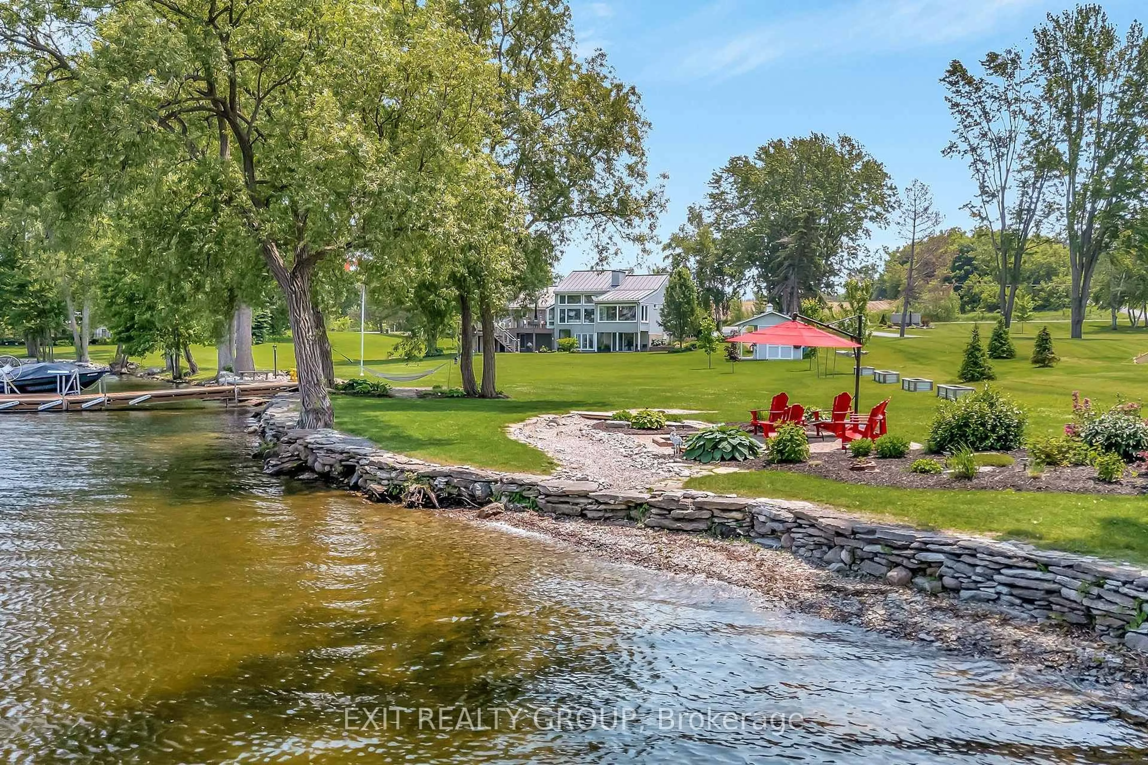 A pic from outside/outdoor area/front of a property/back of a property/a pic from drone, water/lake/river/ocean view for 652 County Rd 3, Prince Edward County Ontario K8N 4Z1