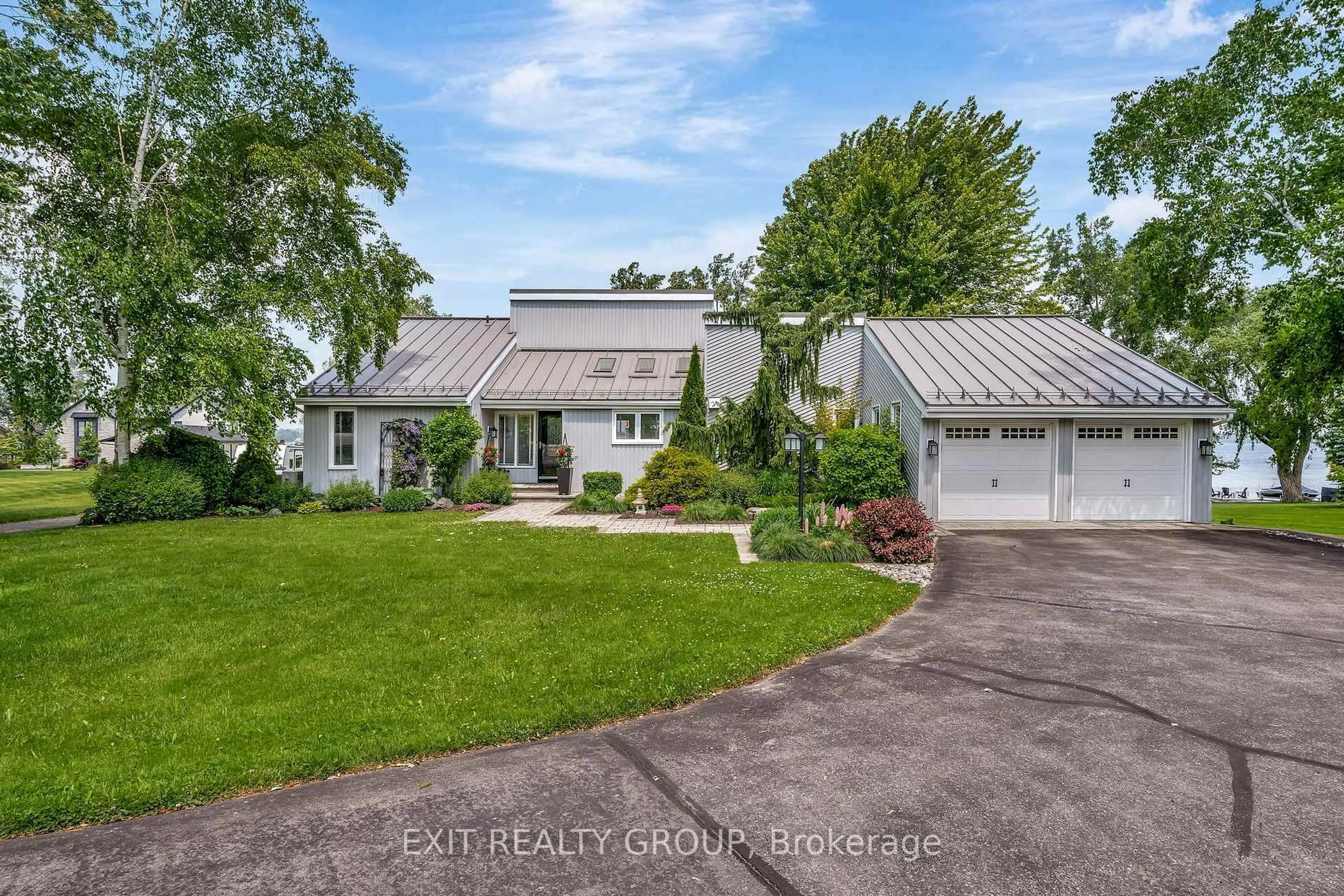 A pic from outside/outdoor area/front of a property/back of a property/a pic from drone, street for 652 County Rd 3, Prince Edward County Ontario K8N 4Z1