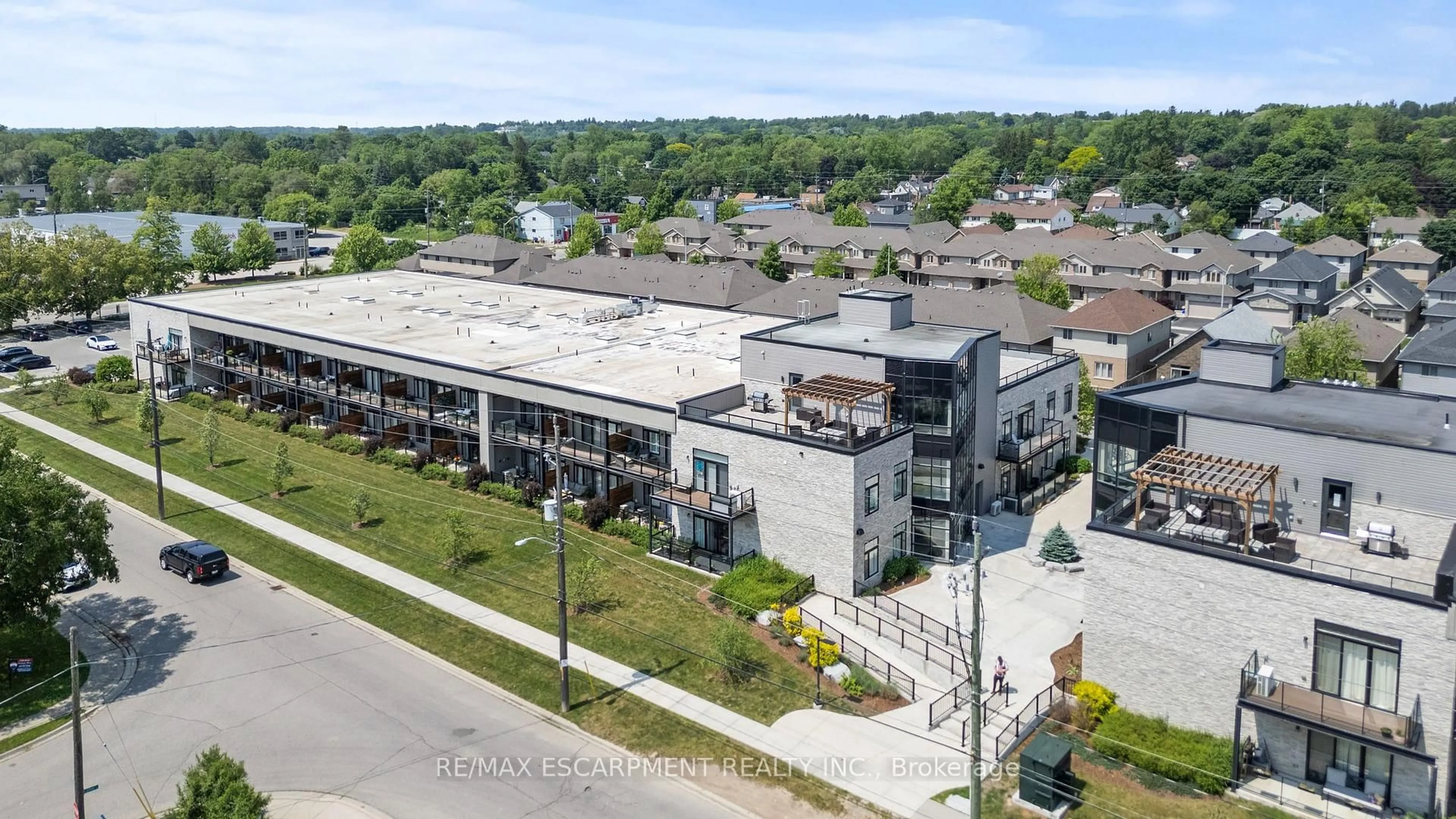 A pic from outside/outdoor area/front of a property/back of a property/a pic from drone, unknown for 85 Morrell St #111A, Brantford Ontario N3T 4J6