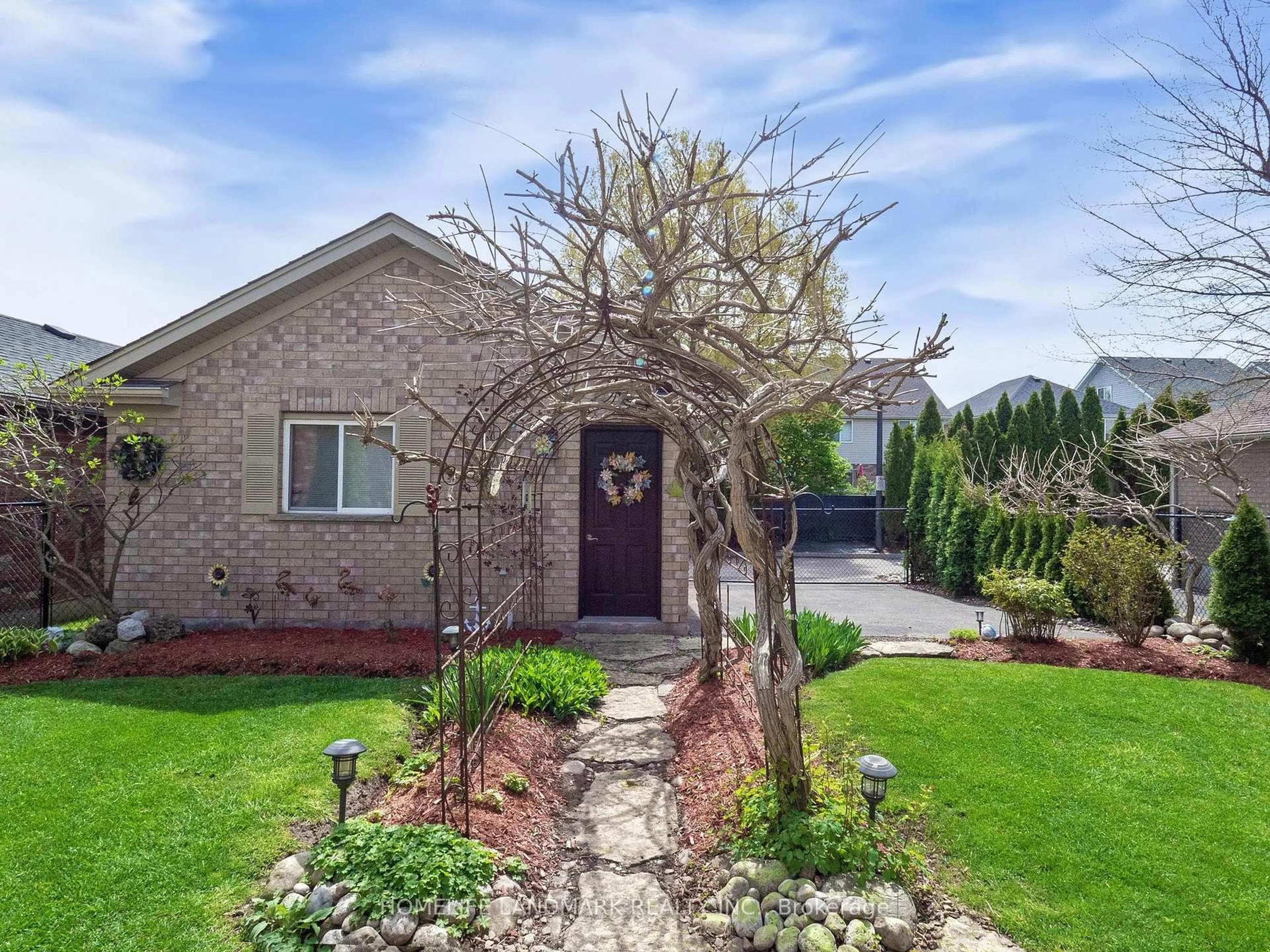 Home with brick exterior material, street for 79 Clairfields Dr, Guelph Ontario N1L 1L9