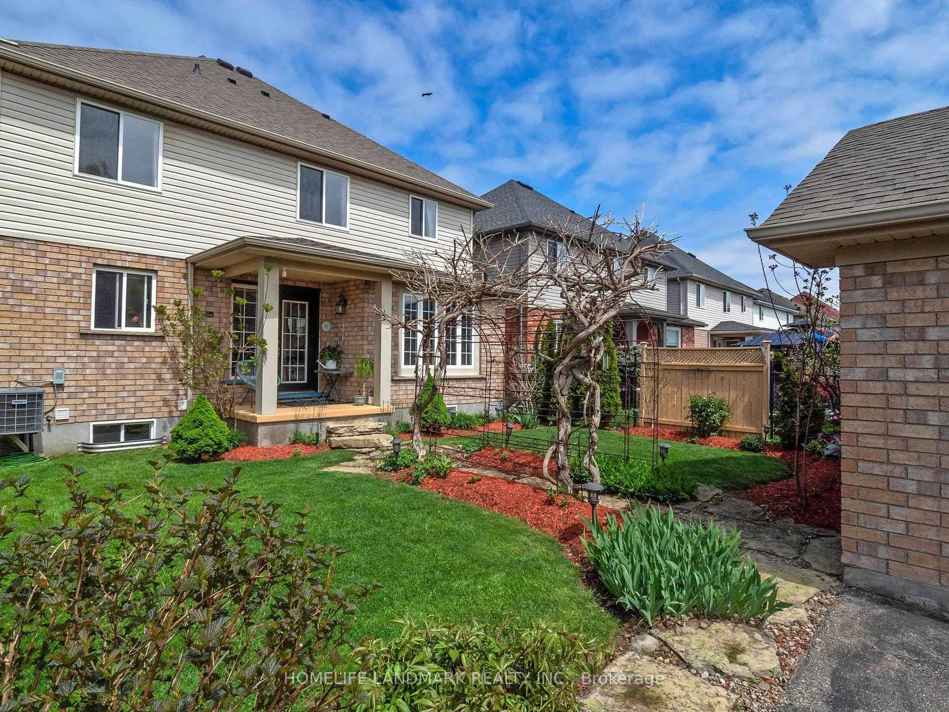 Home with brick exterior material, street for 79 Clairfields Dr, Guelph Ontario N1L 1L9