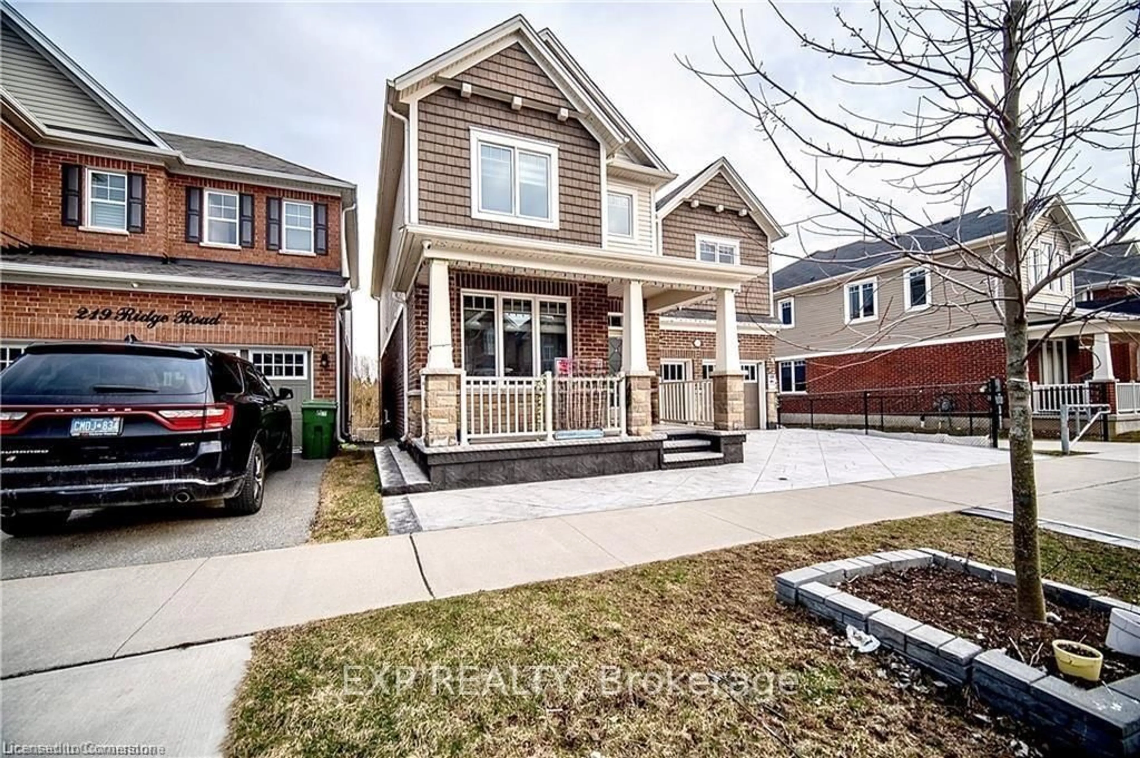 Home with brick exterior material, street for 215 Ridge Rd, Cambridge Ontario N3E 0C2
