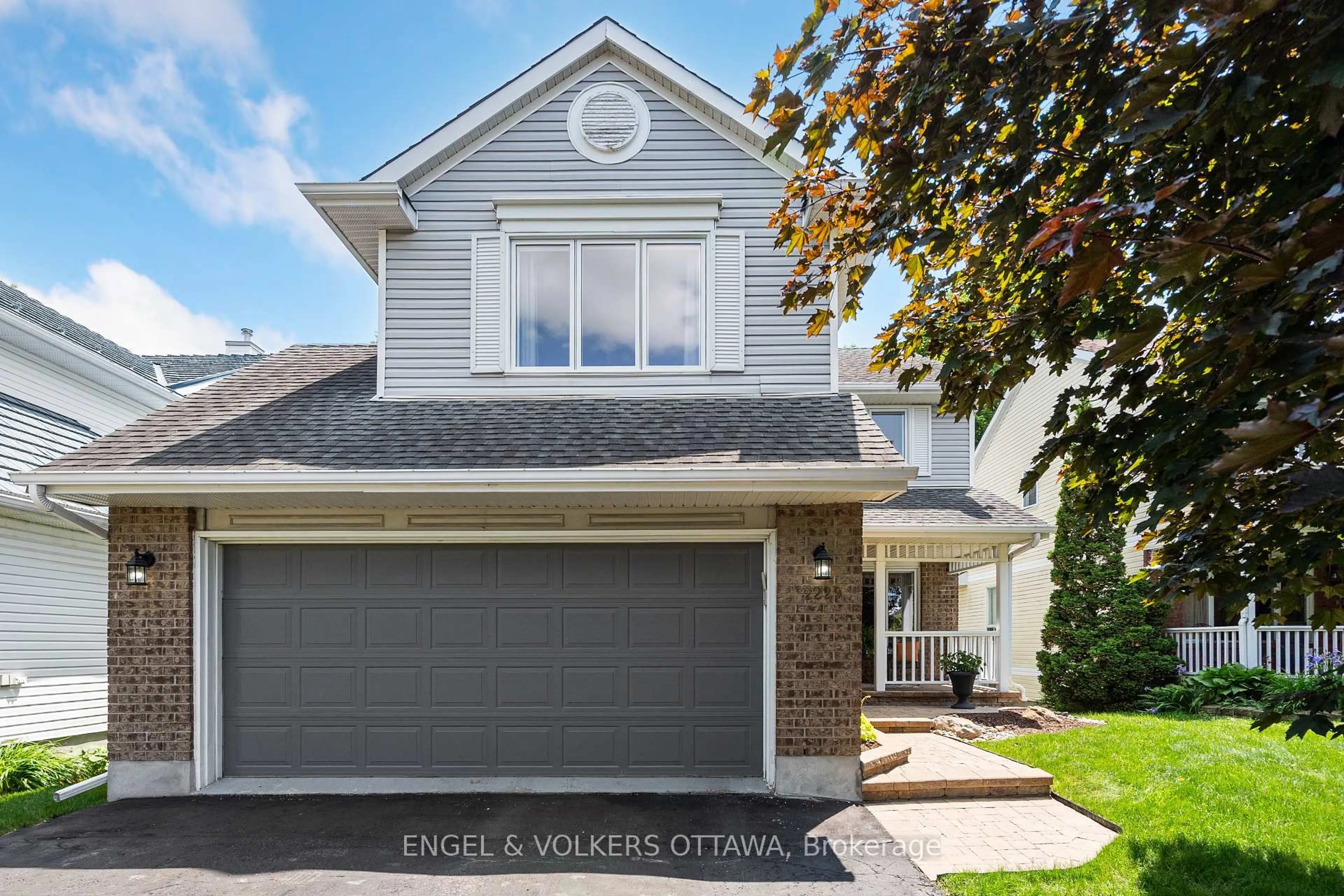 Home with vinyl exterior material, street for 2229 Nature Trail Cres, Ottawa Ontario K1W 1E7