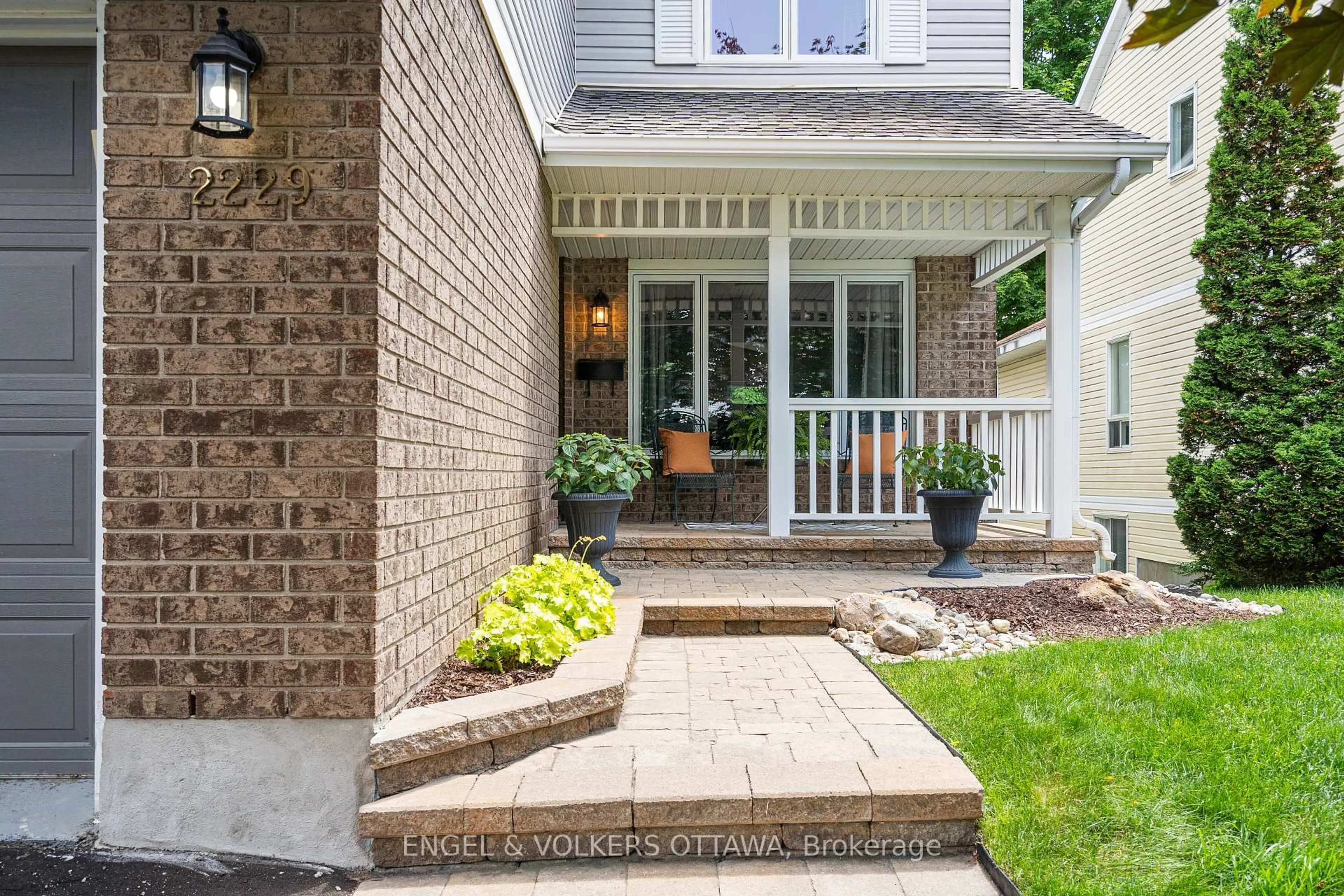 Home with brick exterior material, street for 2229 Nature Trail Cres, Ottawa Ontario K1W 1E7