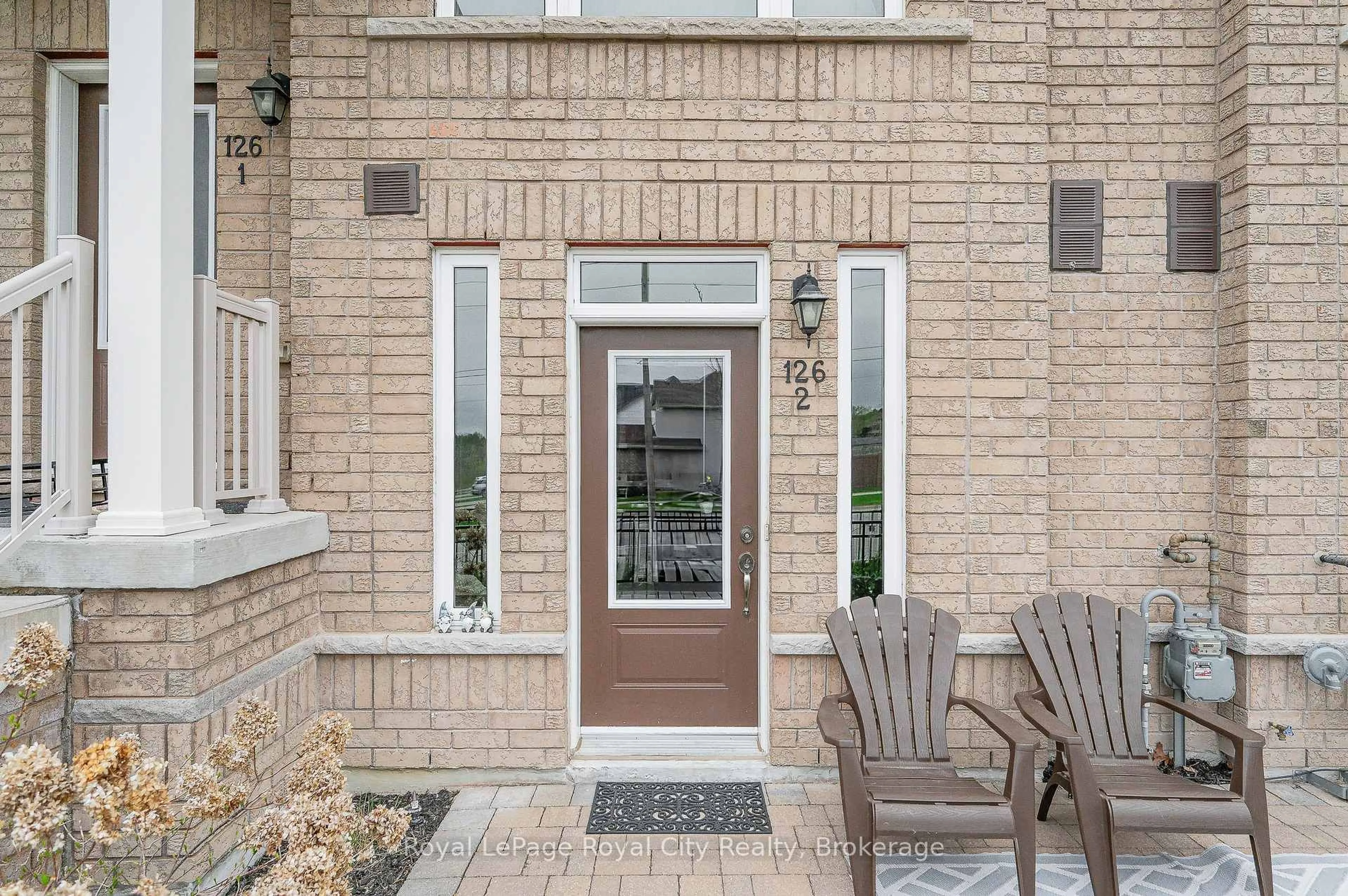 Home with brick exterior material, street for 126 Watson Pkwy #2, Guelph Ontario N1E 0P6