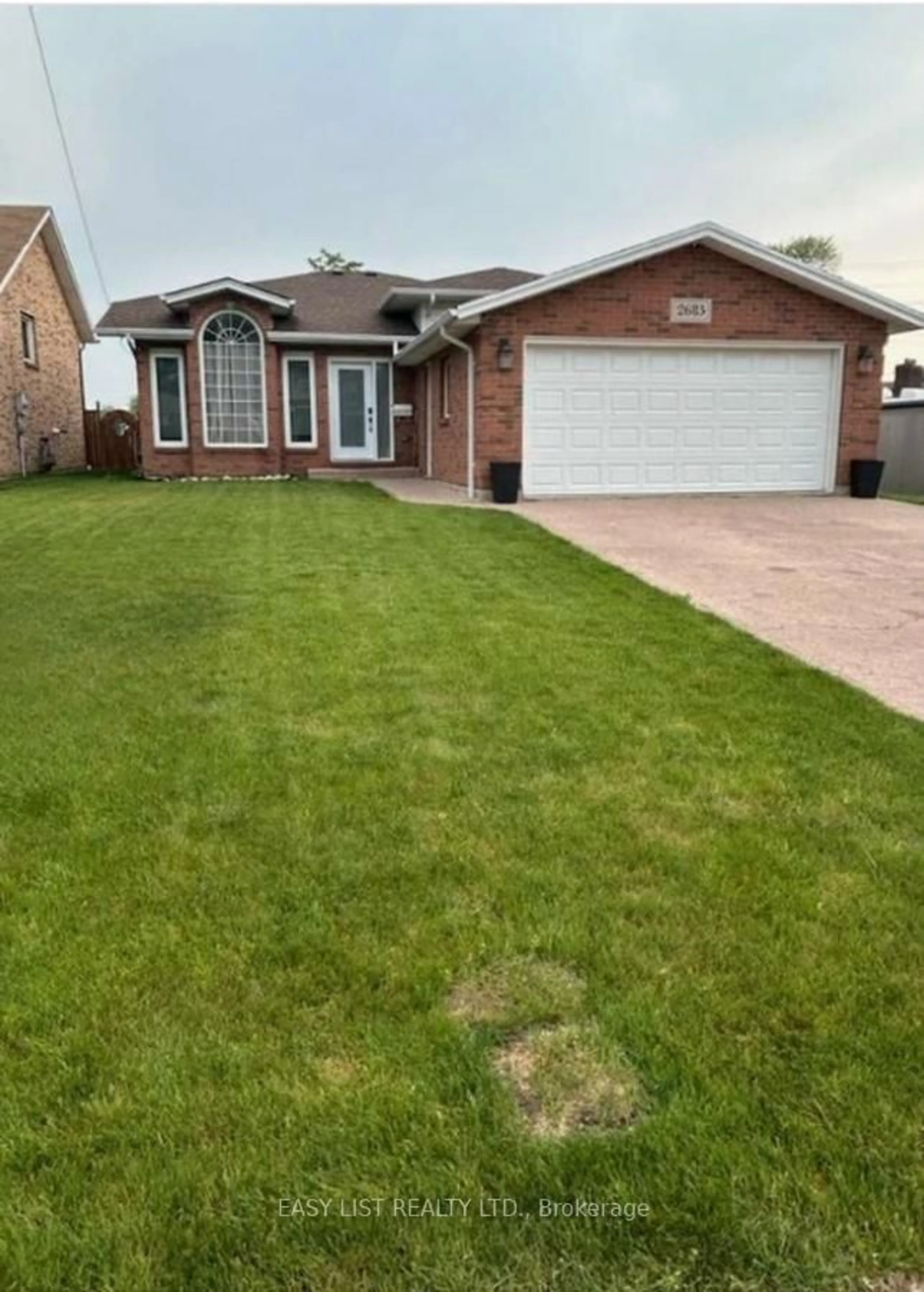 Home with brick exterior material, street for 2685 Tourangeau Rd, Windsor Ontario N8W 5M2
