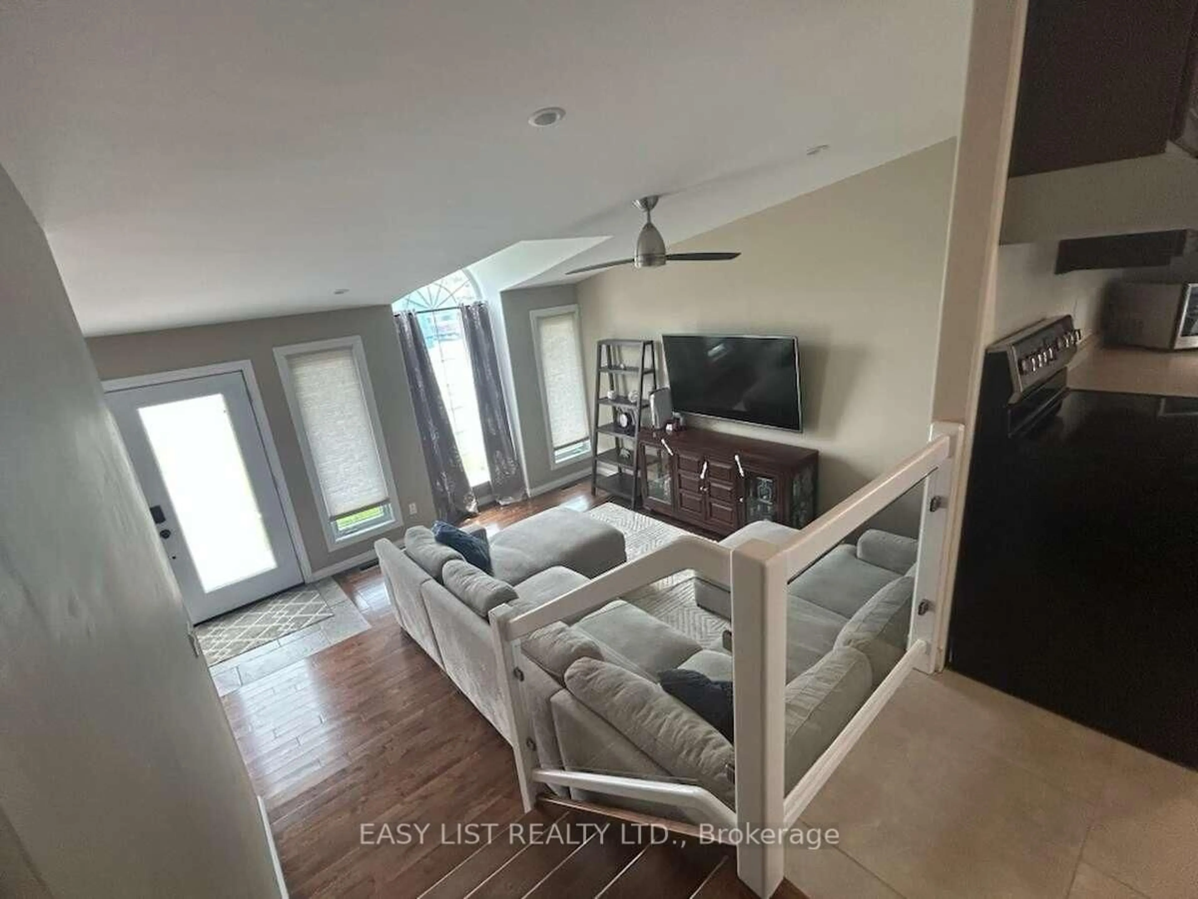 Living room with furniture, unknown for 2685 Tourangeau Rd, Windsor Ontario N8W 5M2