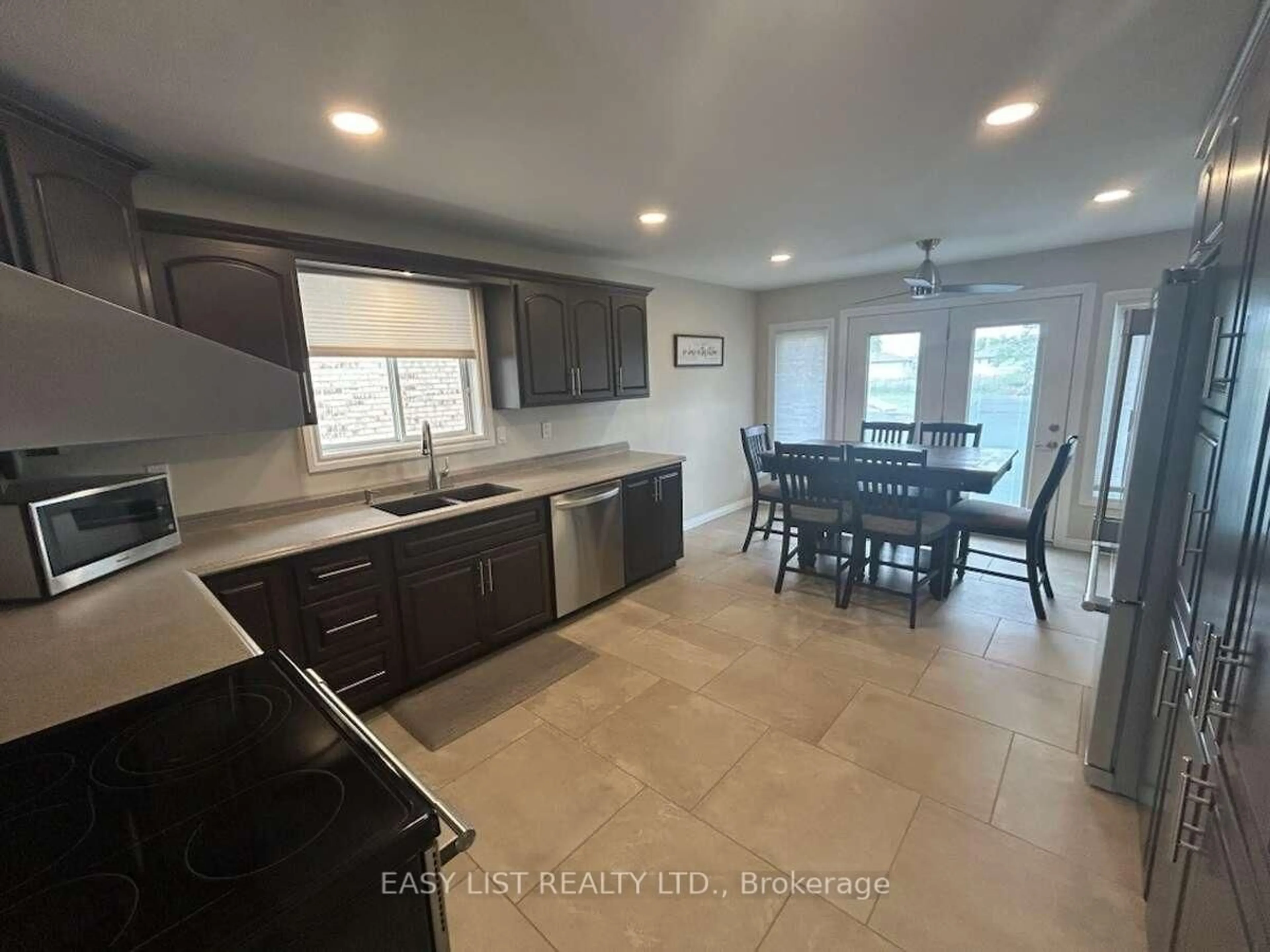 Open concept kitchen, ceramic/tile floor for 2685 Tourangeau Rd, Windsor Ontario N8W 5M2
