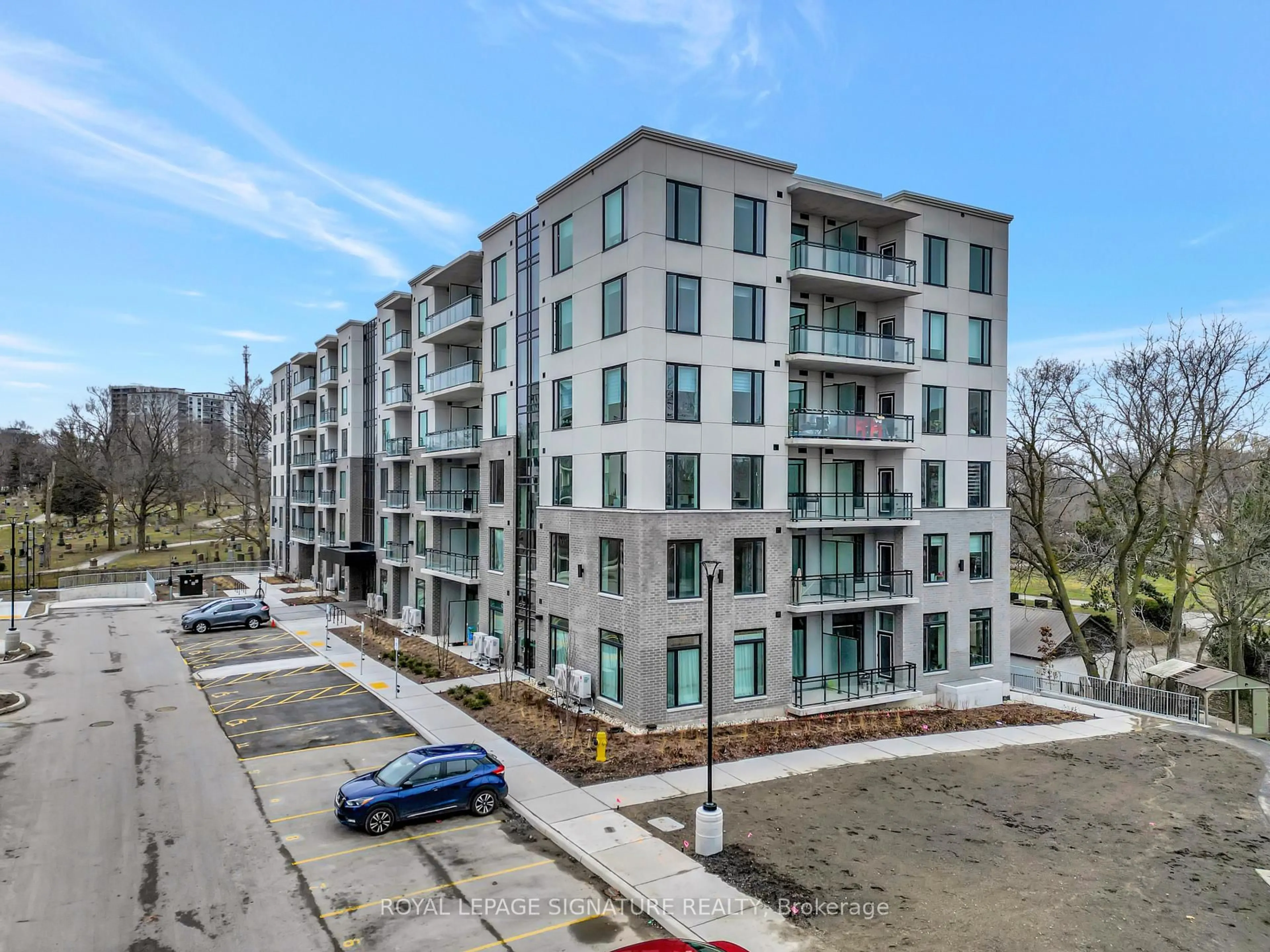 A pic from outside/outdoor area/front of a property/back of a property/a pic from drone, city buildings view from balcony for 103 Roger St #210, Waterloo Ontario N2J 0G2