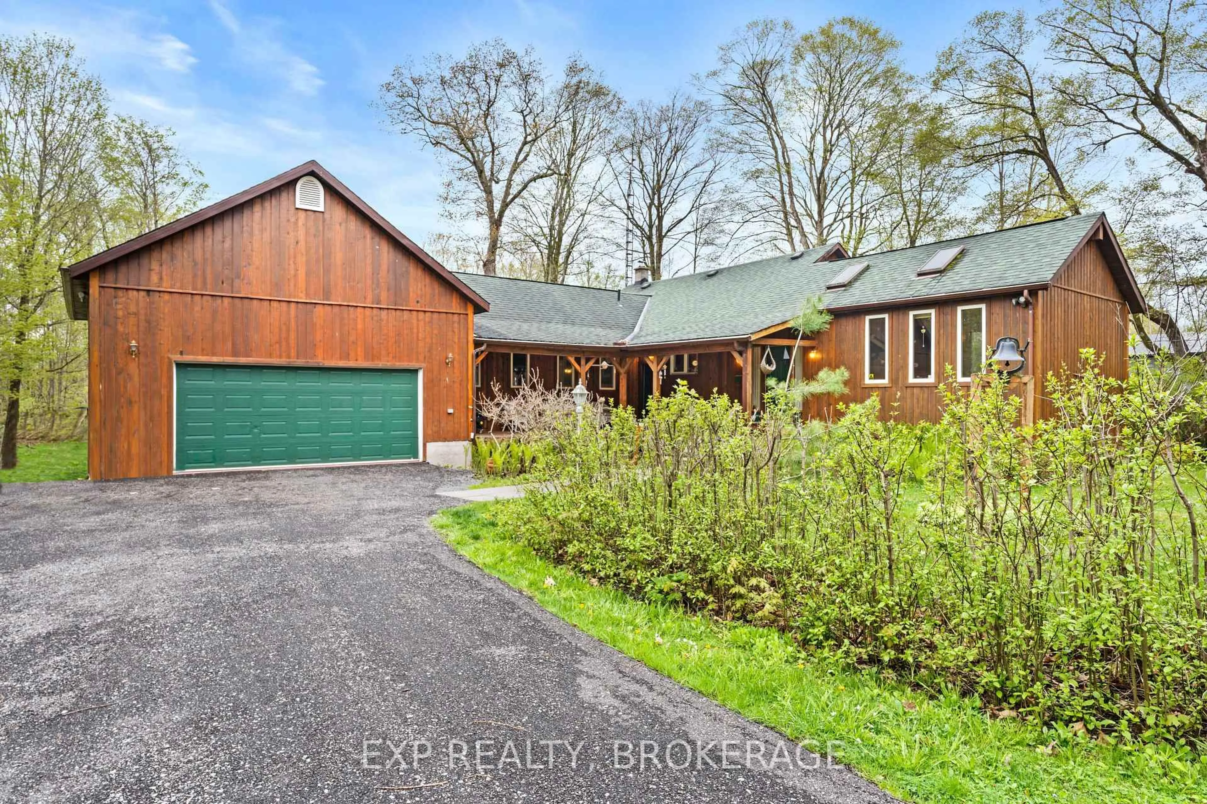 A pic from outside/outdoor area/front of a property/back of a property/a pic from drone, street for 5046 CARRYING PLACE Rd, Battersea Ontario K0H 1H0