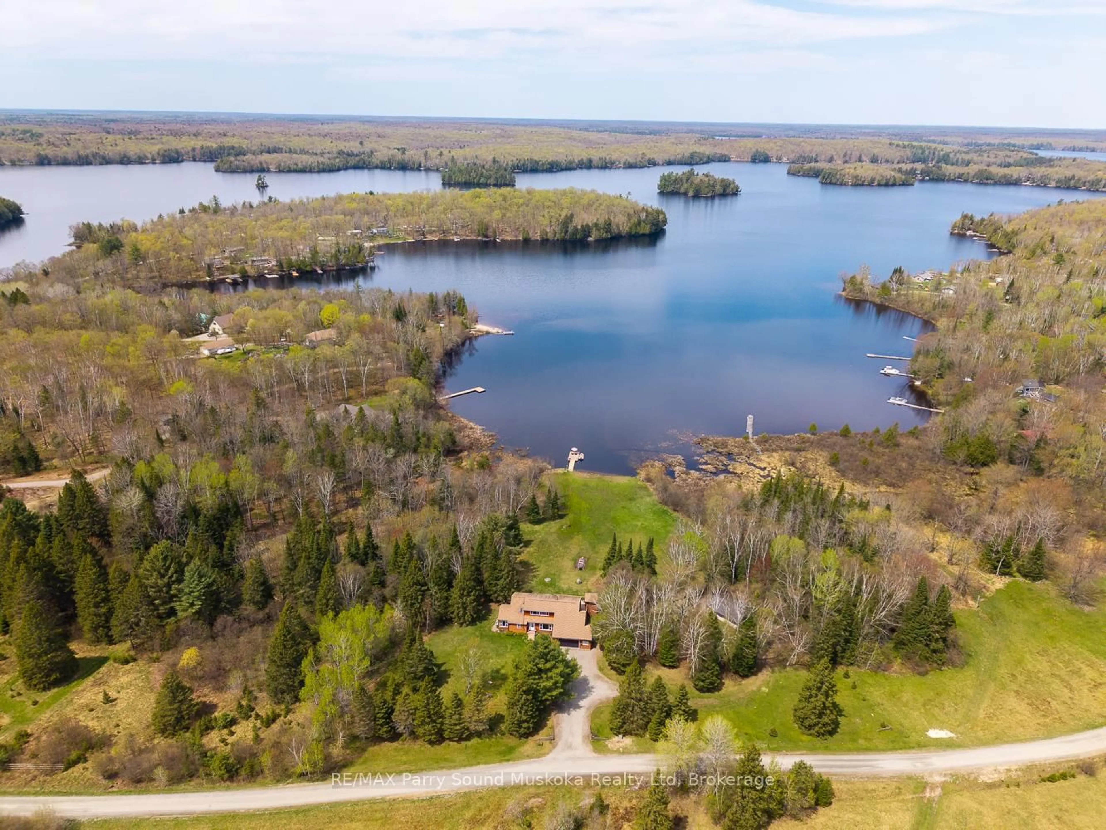 A pic from outside/outdoor area/front of a property/back of a property/a pic from drone, water/lake/river/ocean view for 258 Lakeside Tr, Magnetawan Ontario P0A 1P0