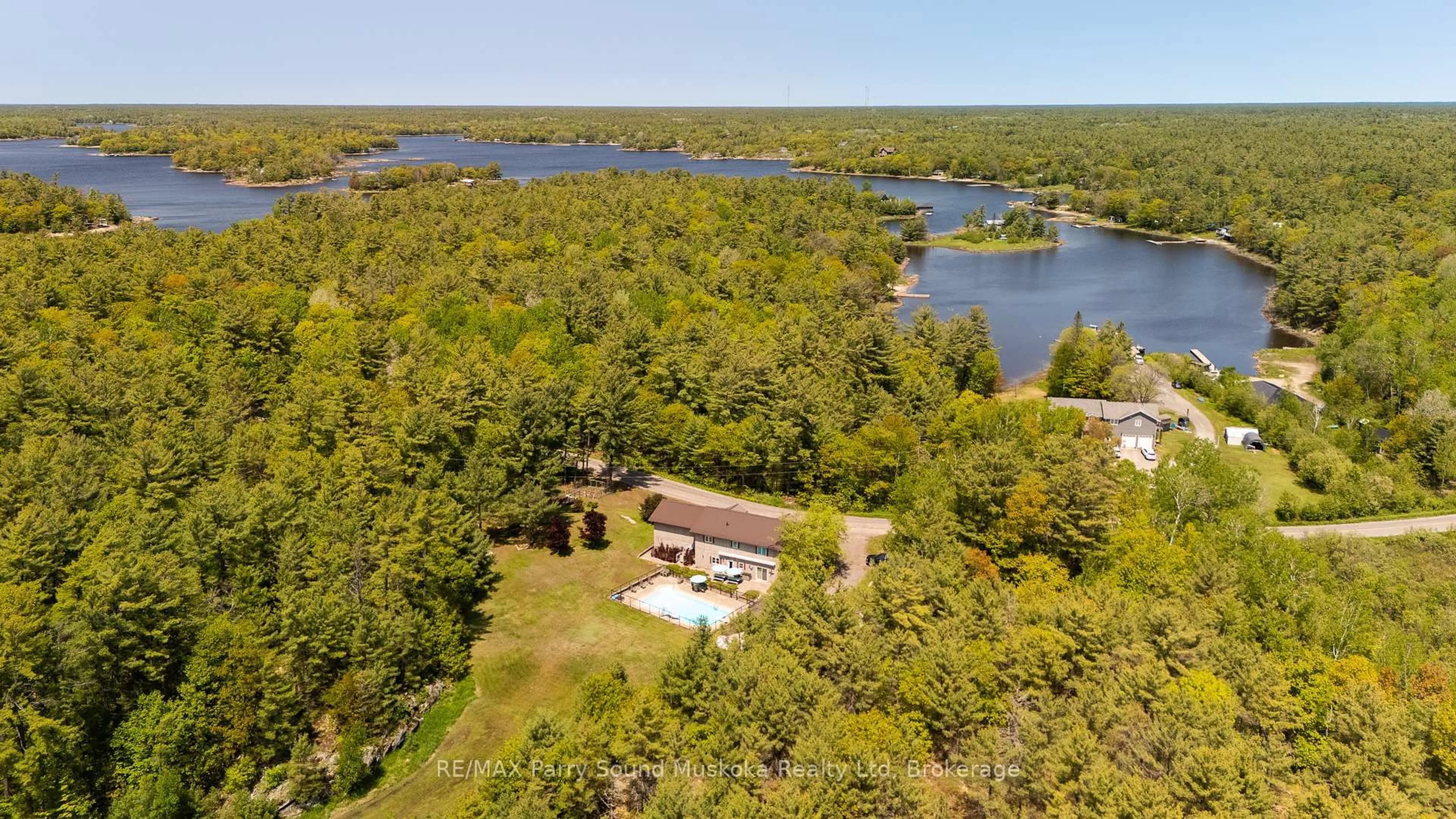 A pic from outside/outdoor area/front of a property/back of a property/a pic from drone, water/lake/river/ocean view for 217 South Shore Rd, The Archipelago Ontario P0G 1K0